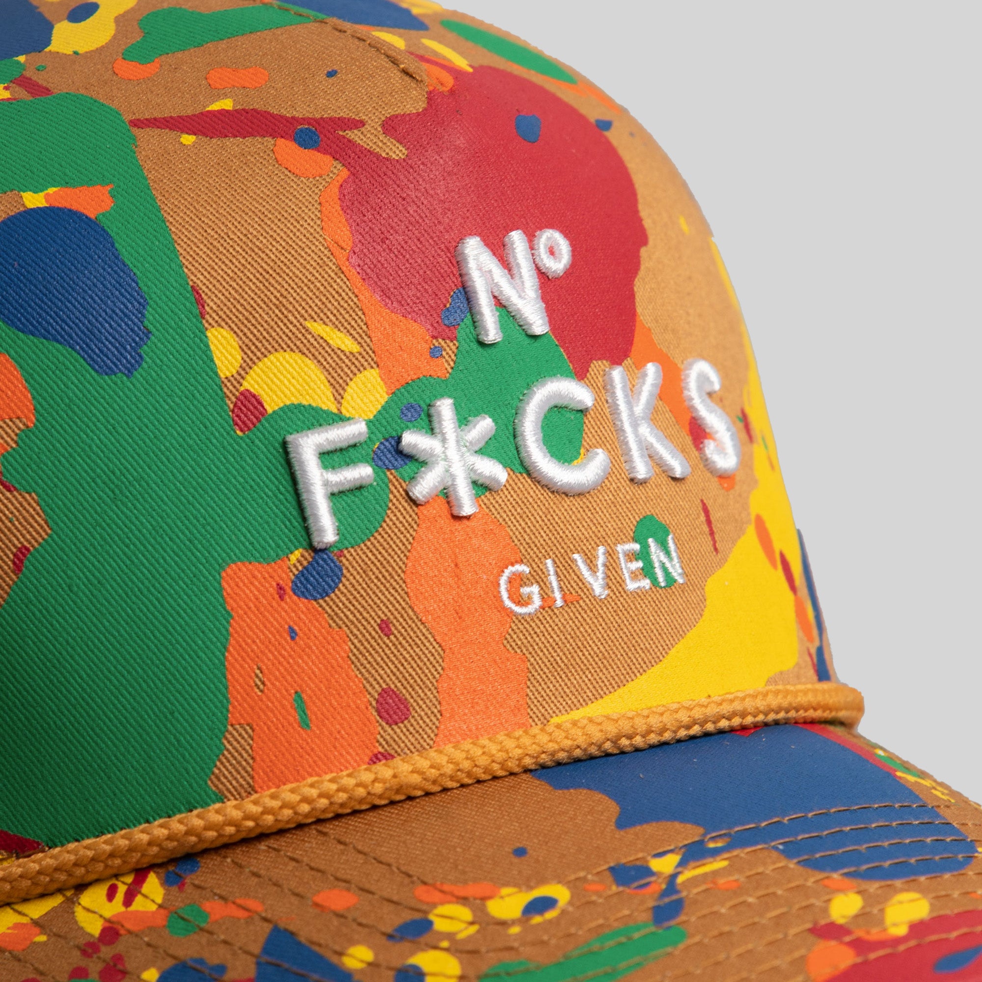 NO F*CKS GIVEN PRIMARY SPLATTER TRUCKER HAT