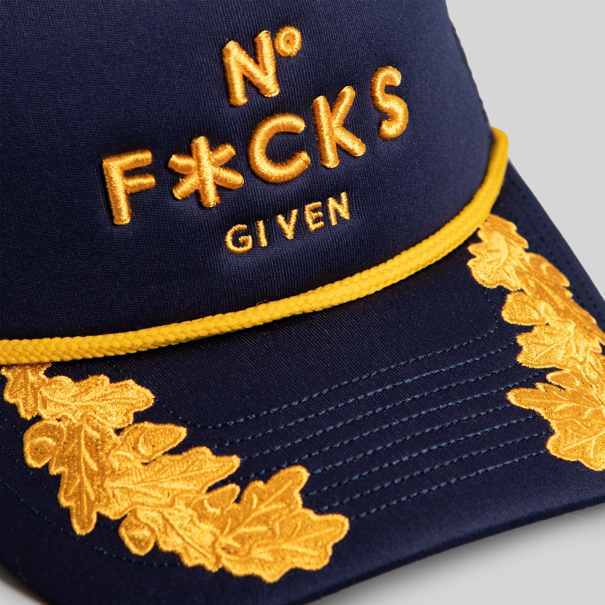 NO F*CKS GIVEN SCRAMBLED EGGS DEEP NAVY TRUCKER HAT