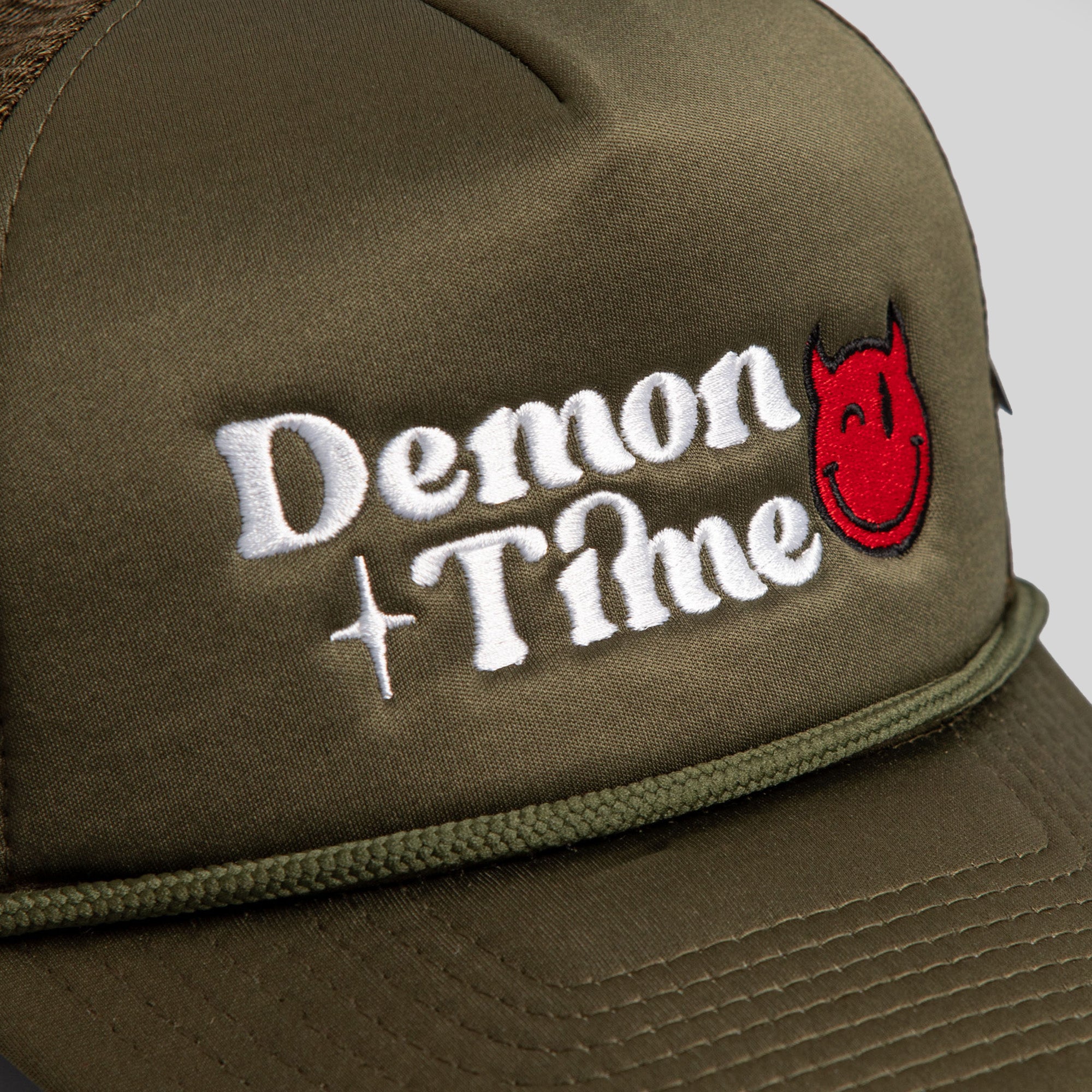 DEMON TIME OLIVE TRUCKER HAT