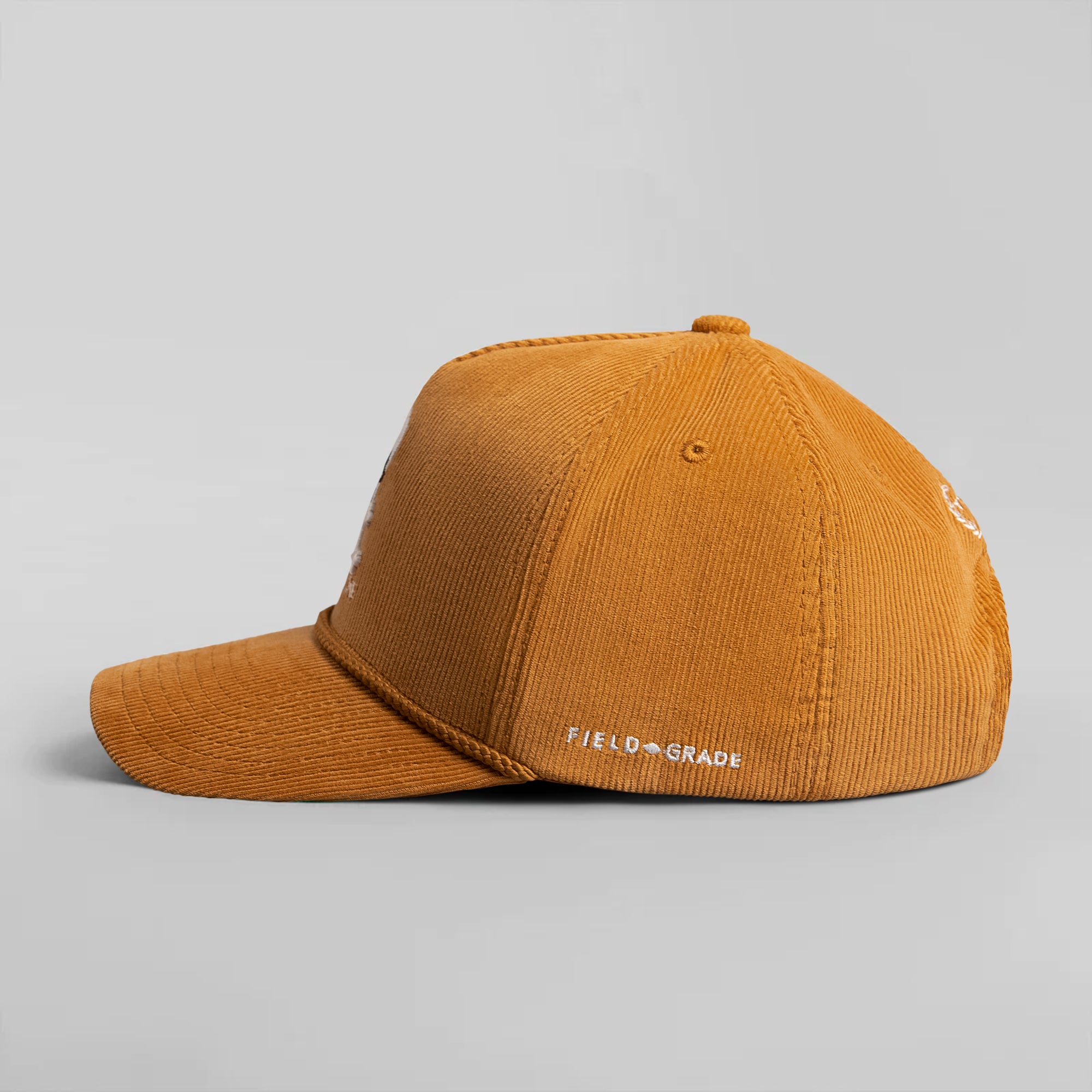 TRUST NO ONE WHEAT CORDUROY TRUCKER HAT