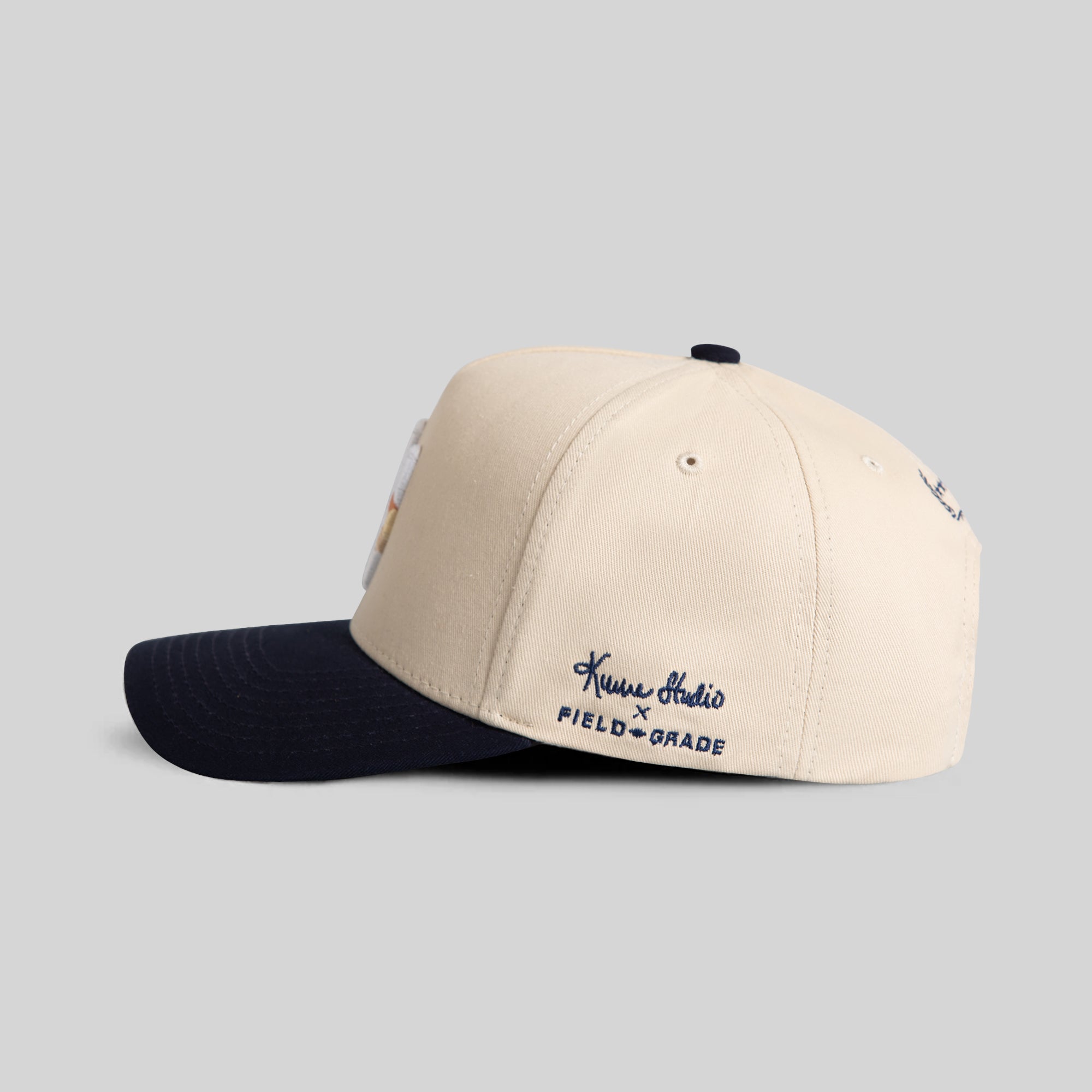 FIELD GRADE X KURVE STUDIO NY IS HEALING SAND NAVY TWILL TRUCKER