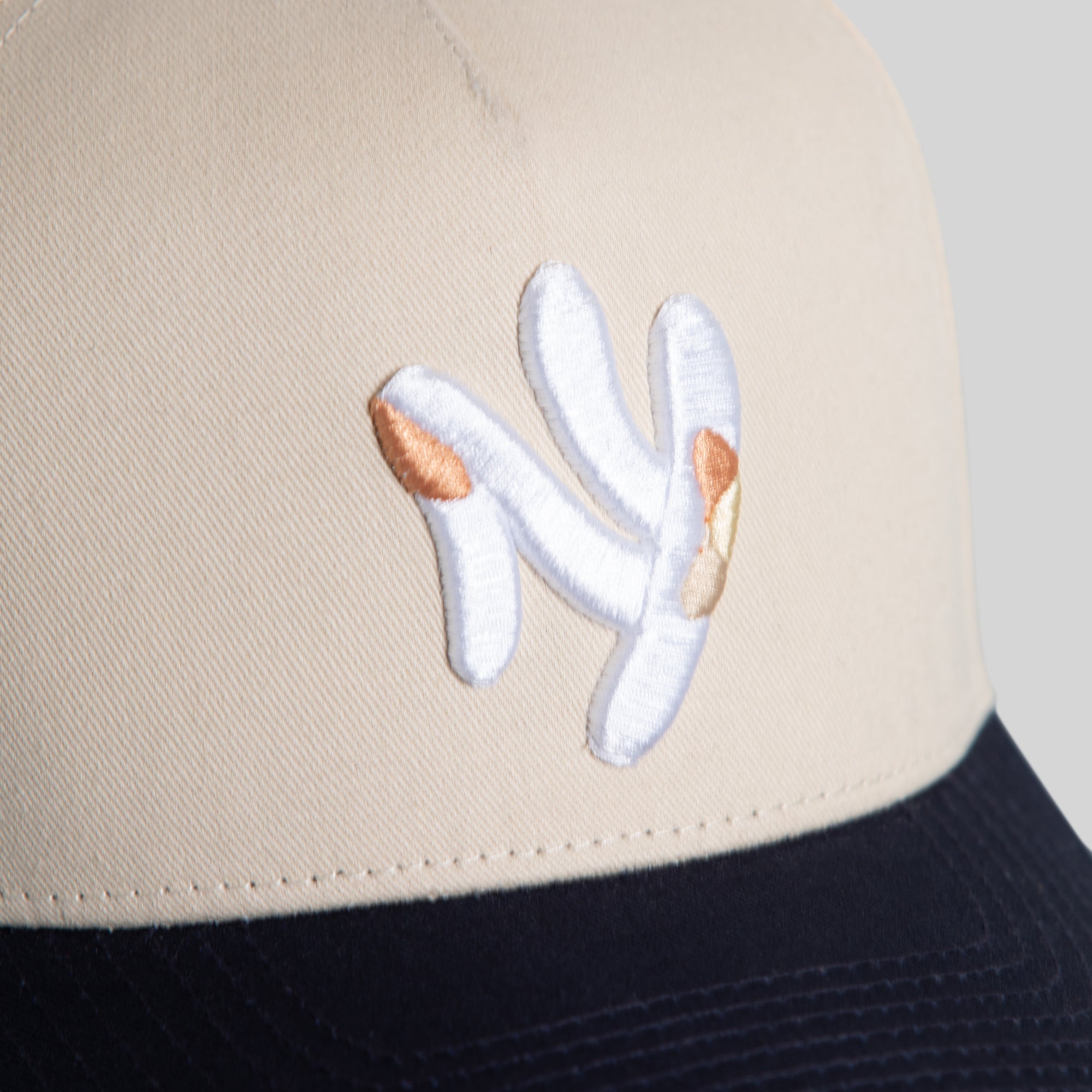 FIELD GRADE X KURVE STUDIO NY IS HEALING SAND NAVY TWILL TRUCKER