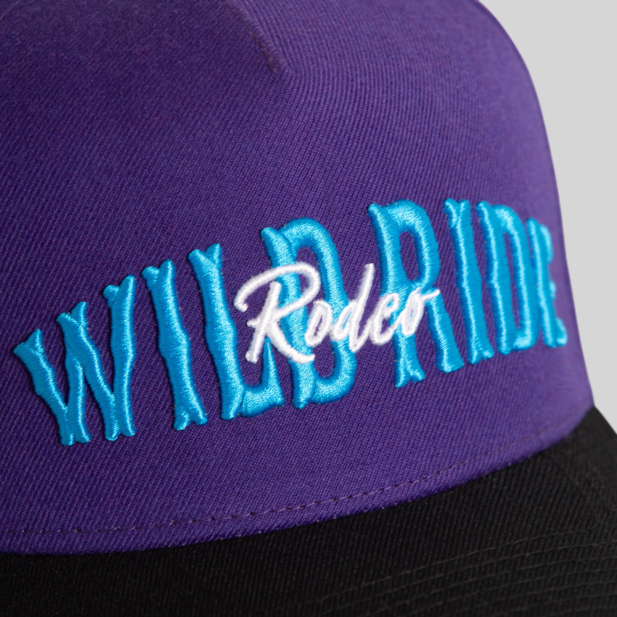 WILD RIDE PURPLE BLACK TRUCKER