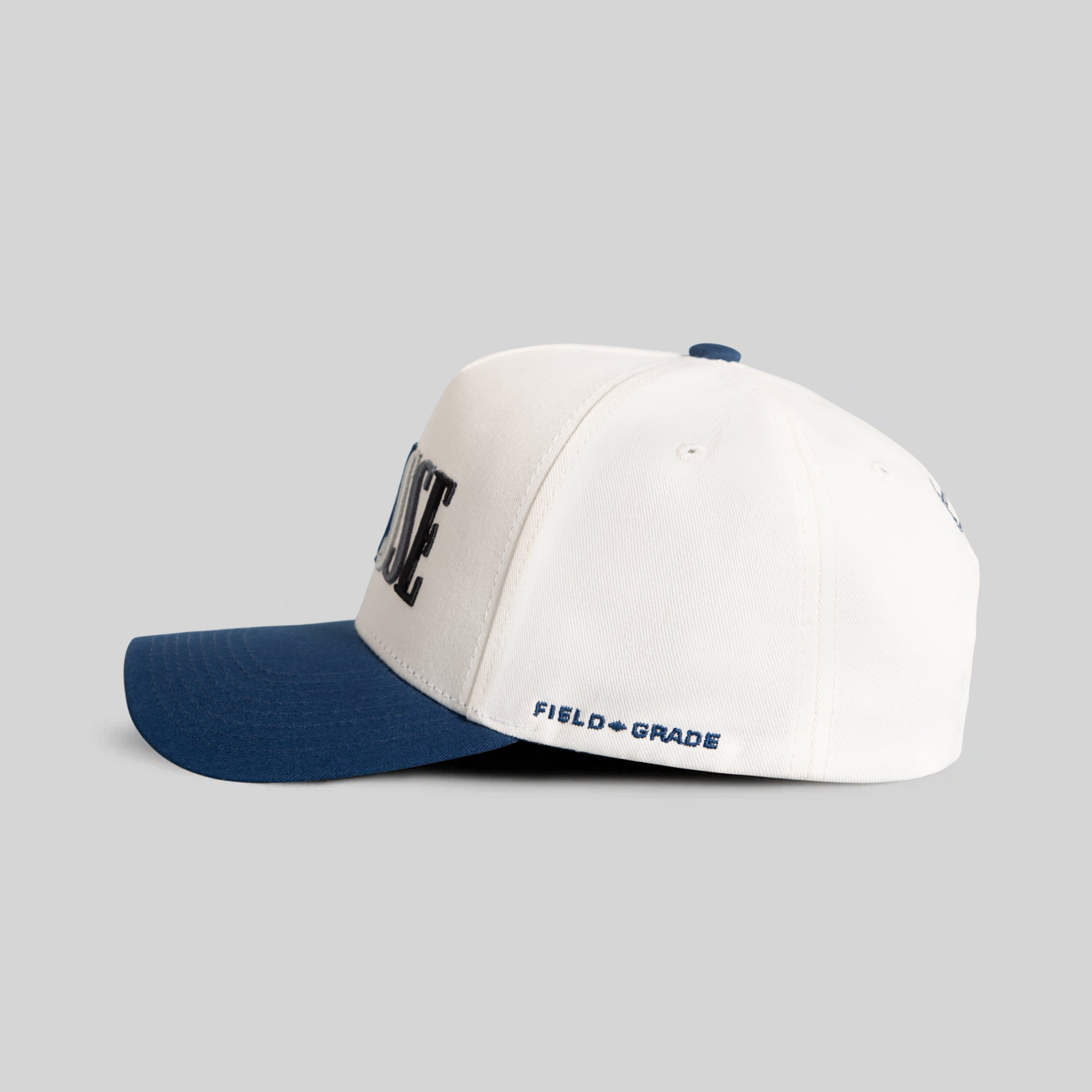 FINESSE OFF WHITE FRENCH BLUE WOOL TRUCKER
