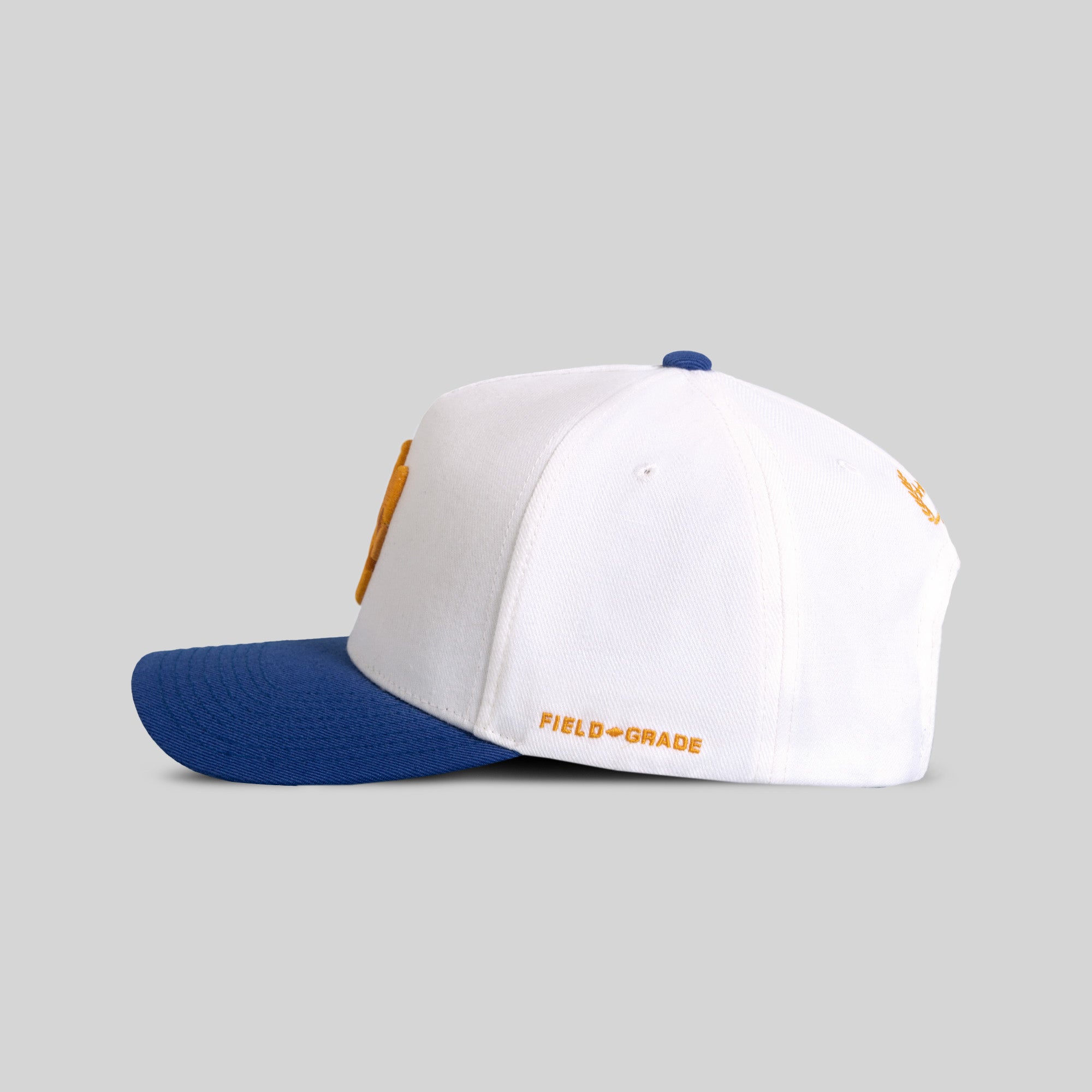 FIELD GRADE X KURVE STUDIO NY IS HEALING OFF WHITE ROYAL WOOL TRUCKER