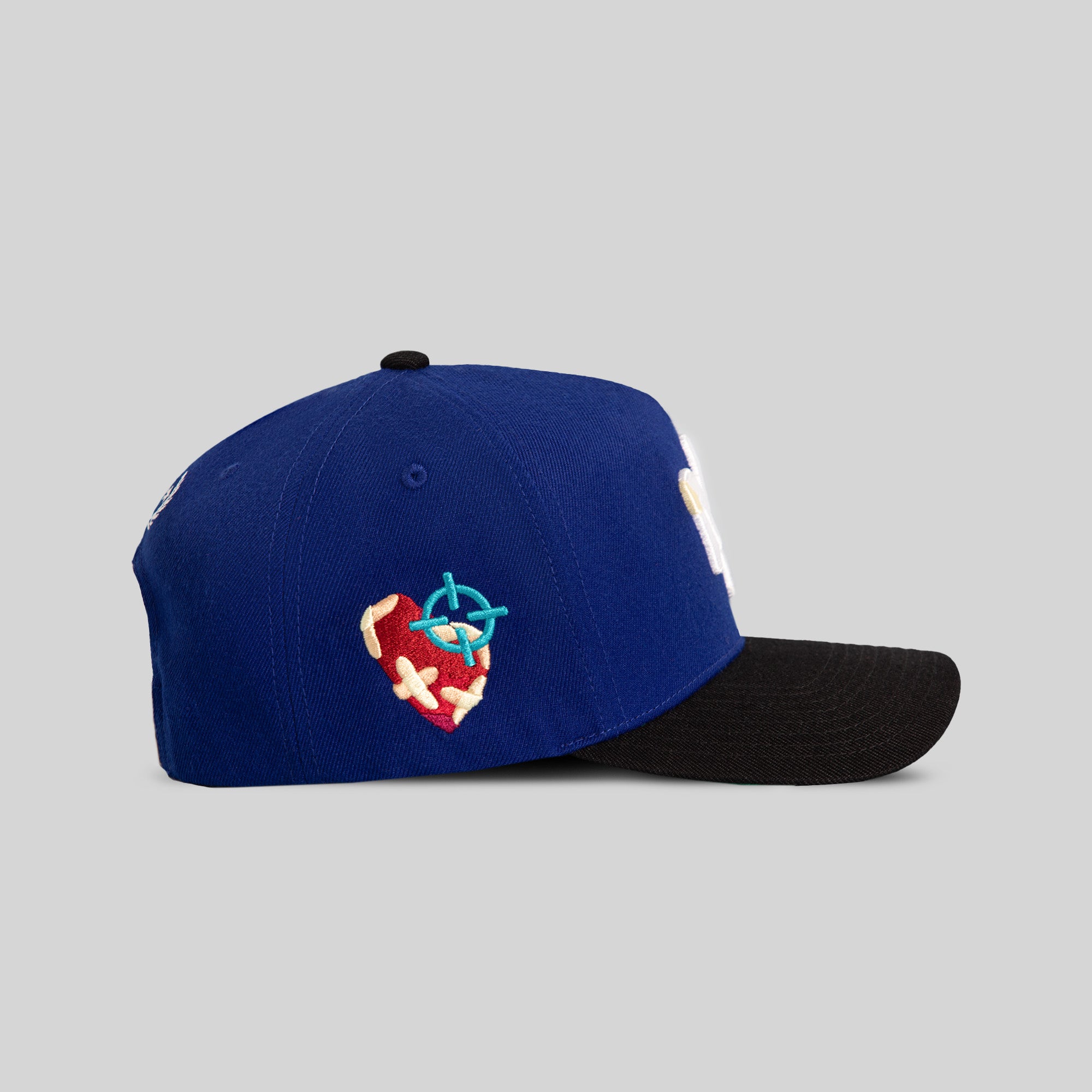 FIELD GRADE X KURVE STUDIO NY IS HEALING ROYAL BLACK WOOL TRUCKER