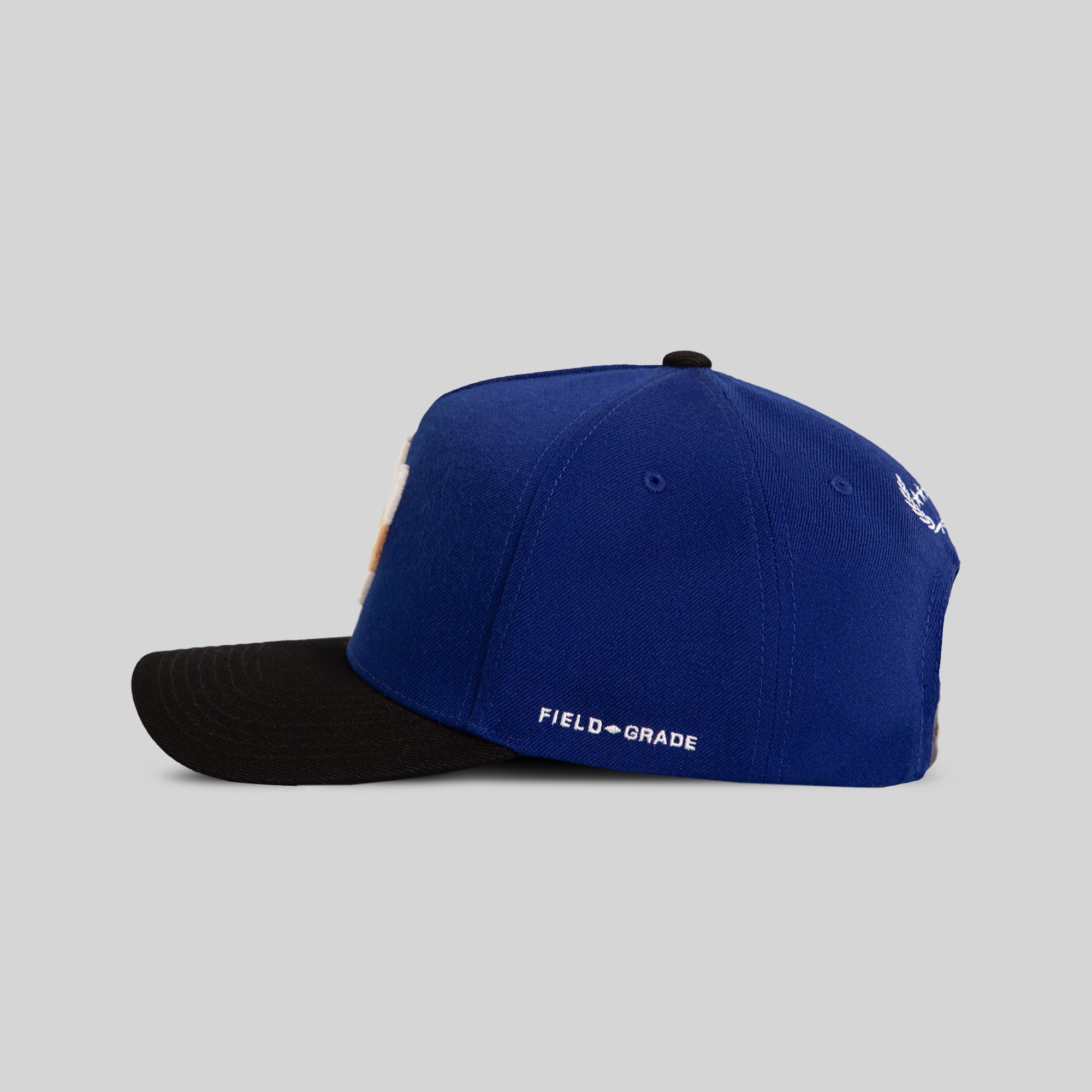 FIELD GRADE X KURVE STUDIO NY IS HEALING ROYAL BLACK WOOL TRUCKER