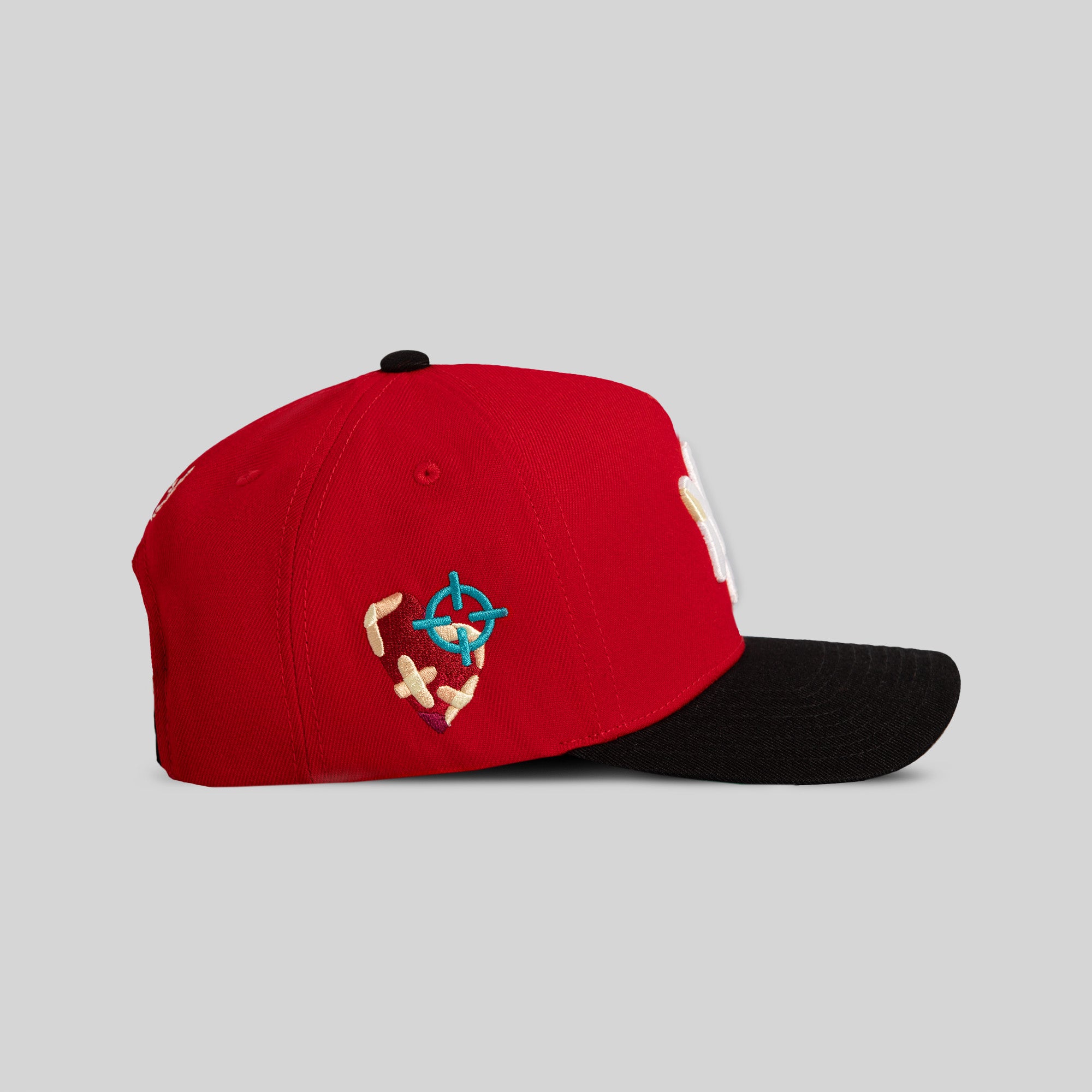 FIELD GRADE X KURVE STUDIO NY IS HEALING RED BLACK WOOL TRUCKER