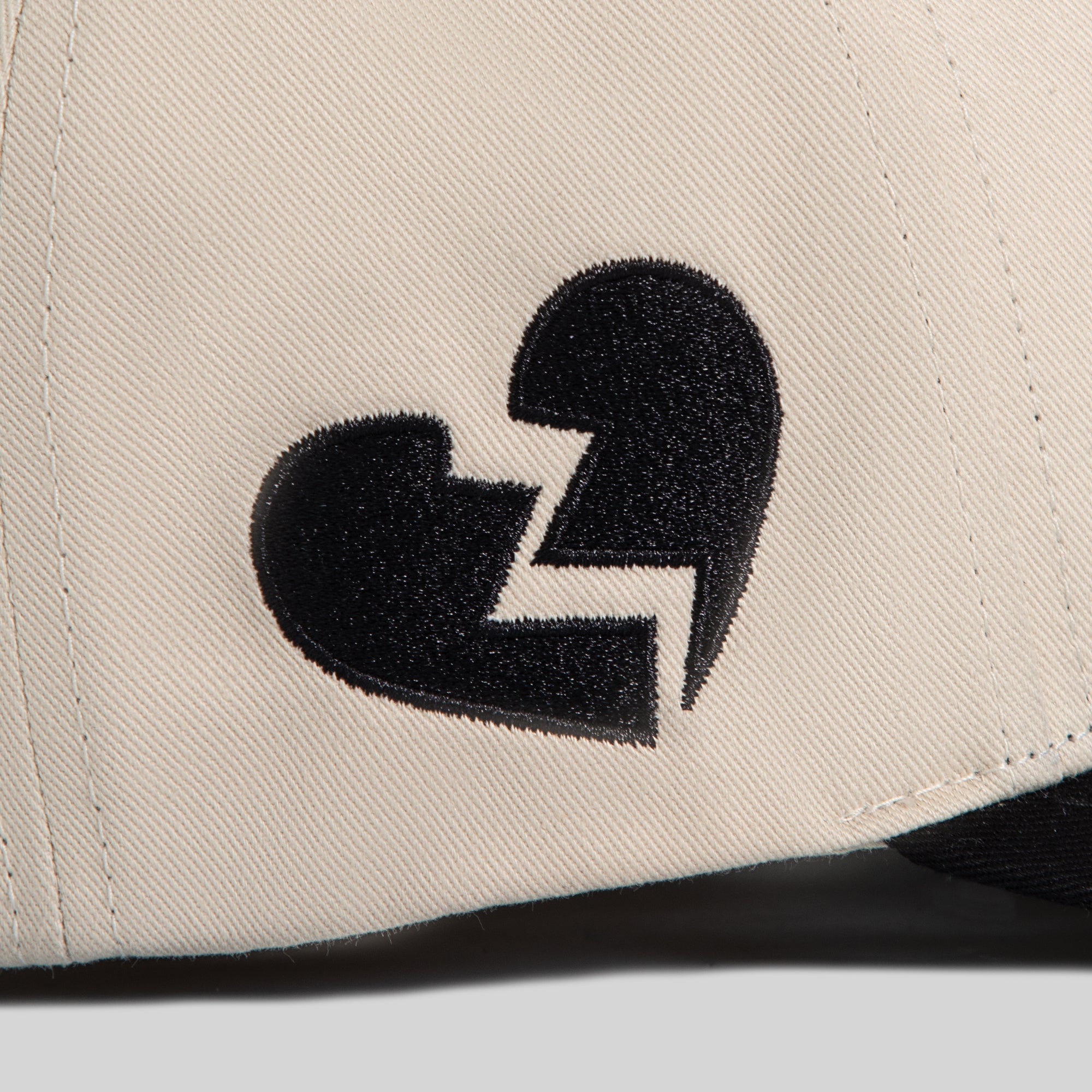 LEAVE YOUR FEELINGS SAND BLACK TWILL TRUCKER