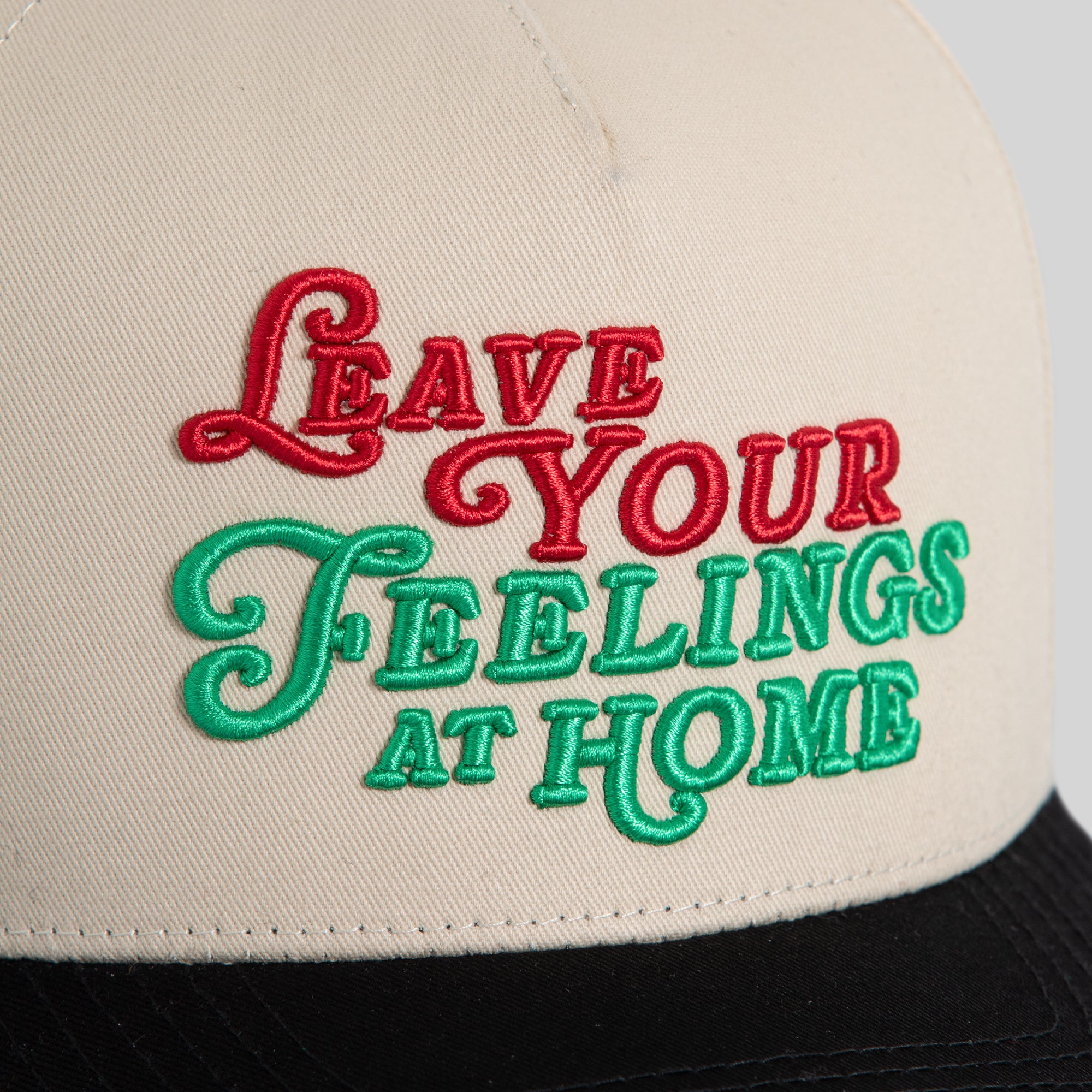 LEAVE YOUR FEELINGS SAND BLACK TWILL TRUCKER