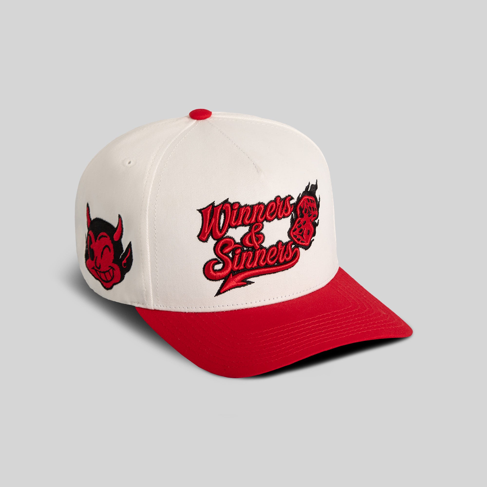 WINNERS AND SINNERS OFF WHITE VARSITY RED TWILL TRUCKER