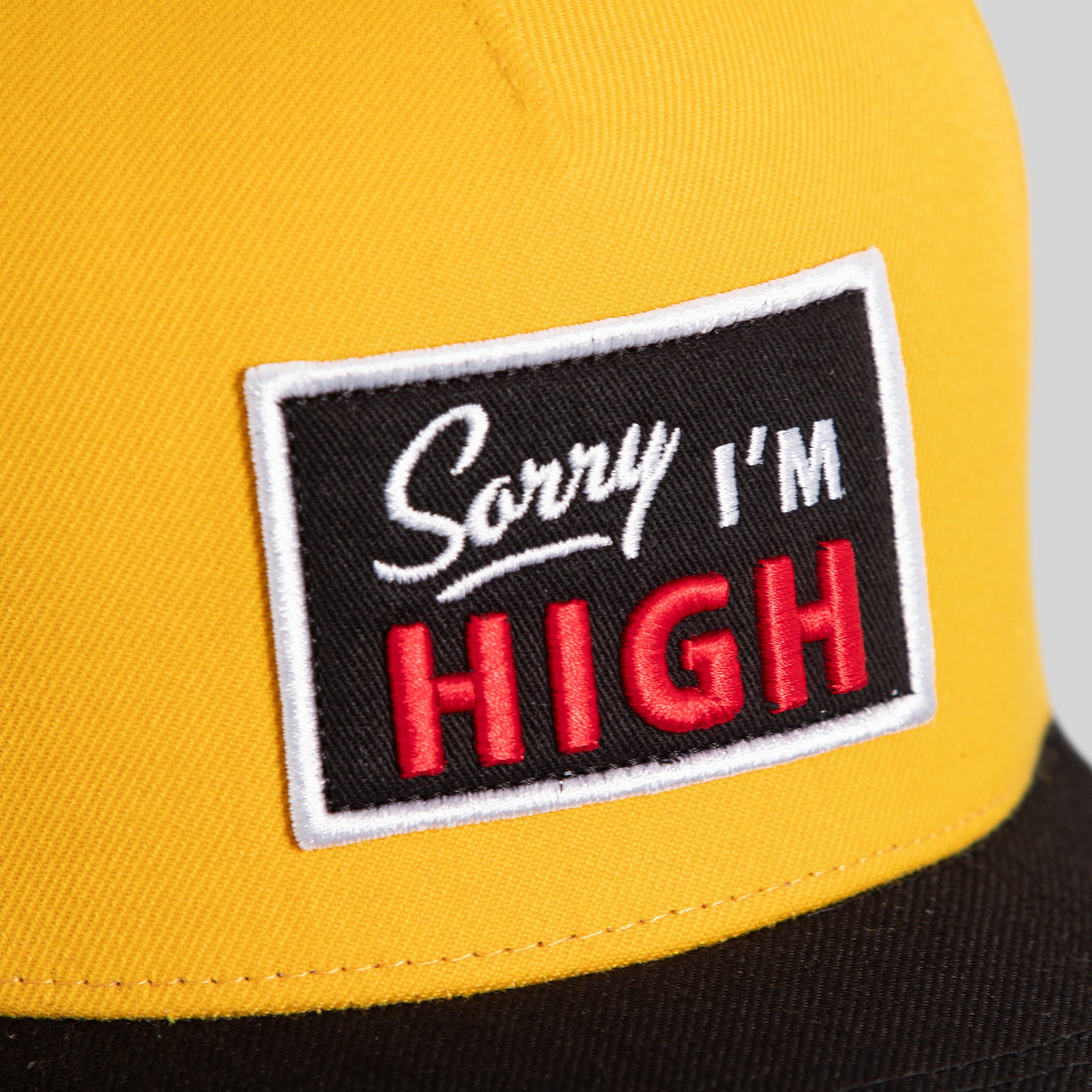 SORRY I'M HIGH ATHLETIC GOLD BLACK WOOL TRUCKER