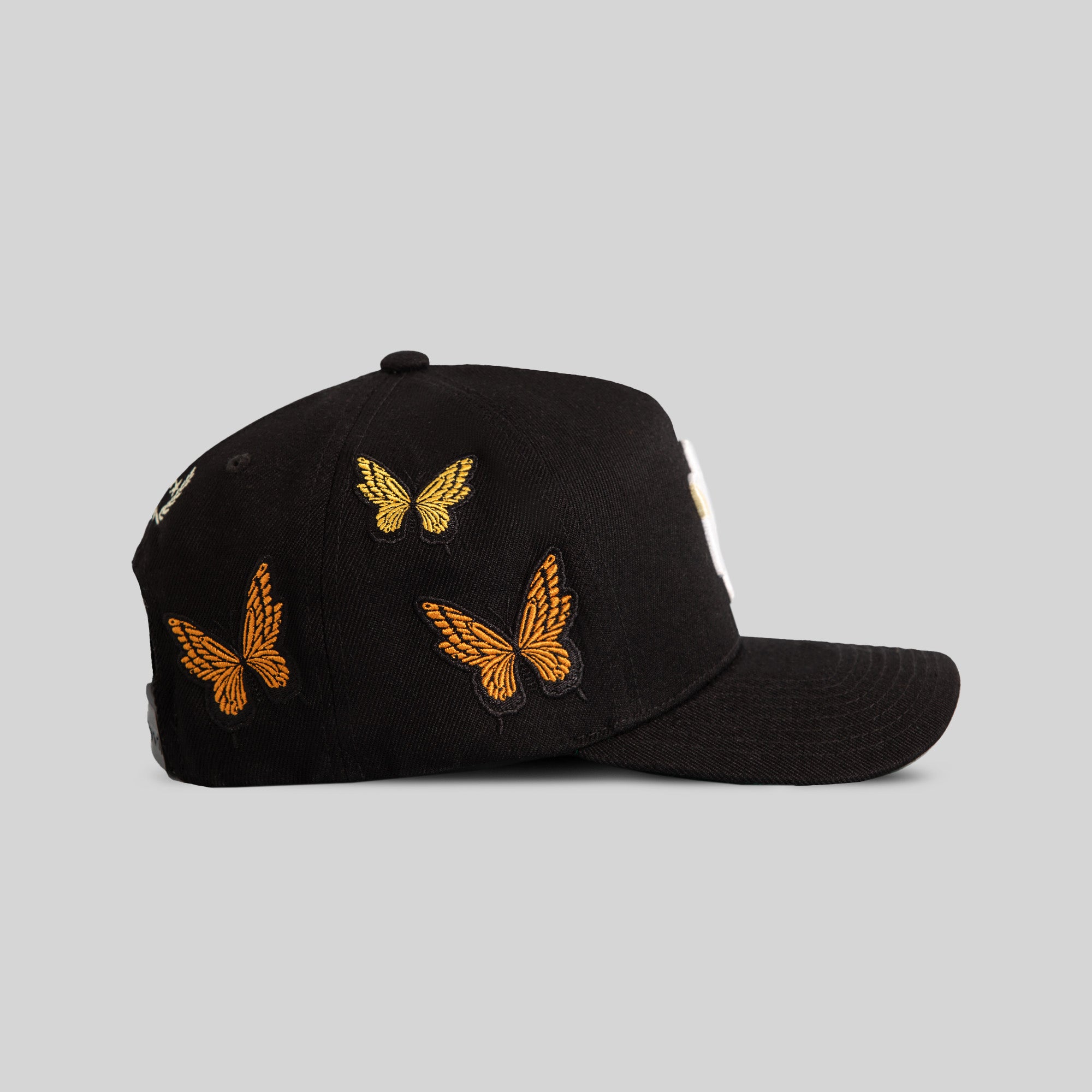 FIELD GRADE X KURVE STUDIO NY IS HEALING BUTTERFLIGHT WOOL TRUCKER