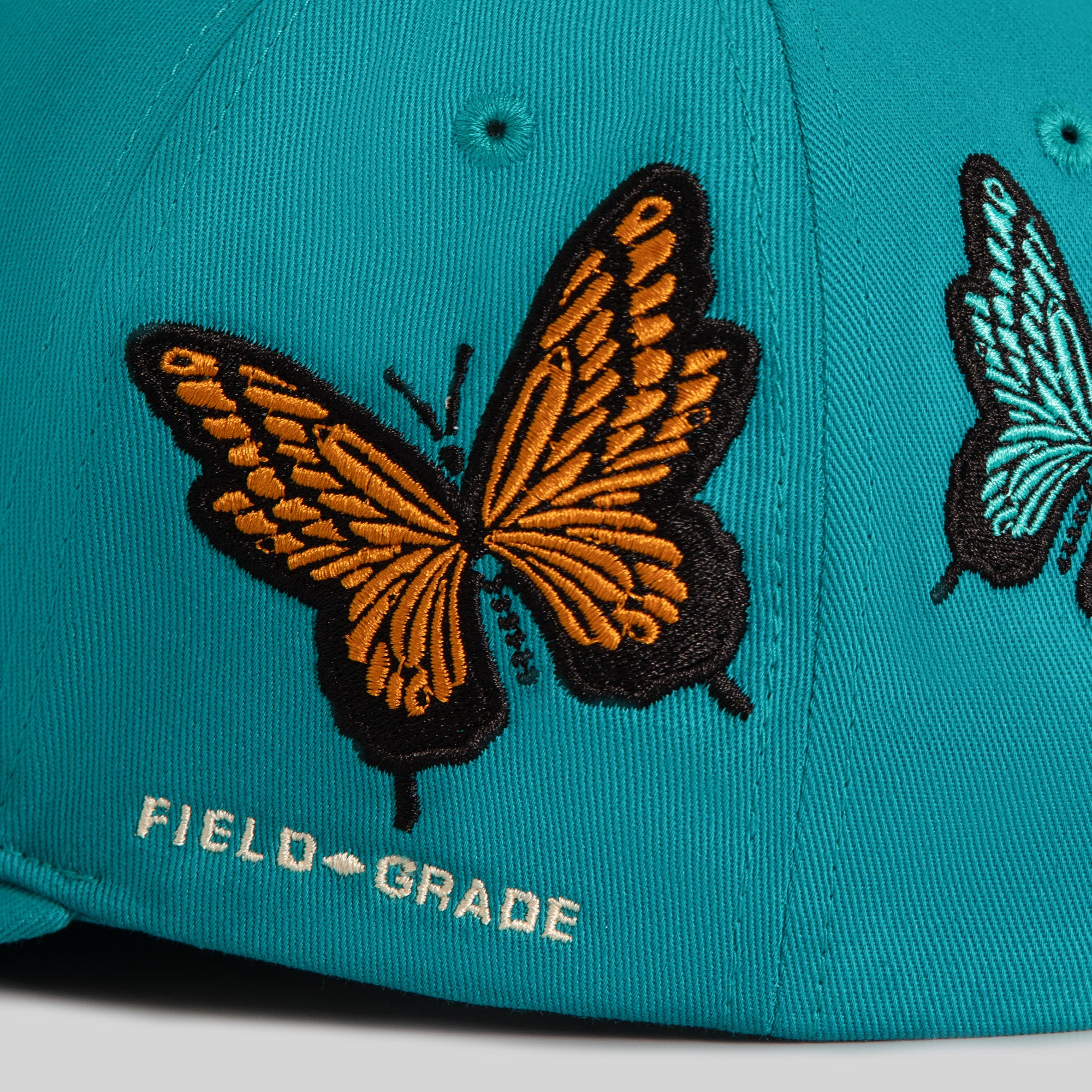 HENNYTHING GOES BUTTERFLIGHT TWILL TRUCKER