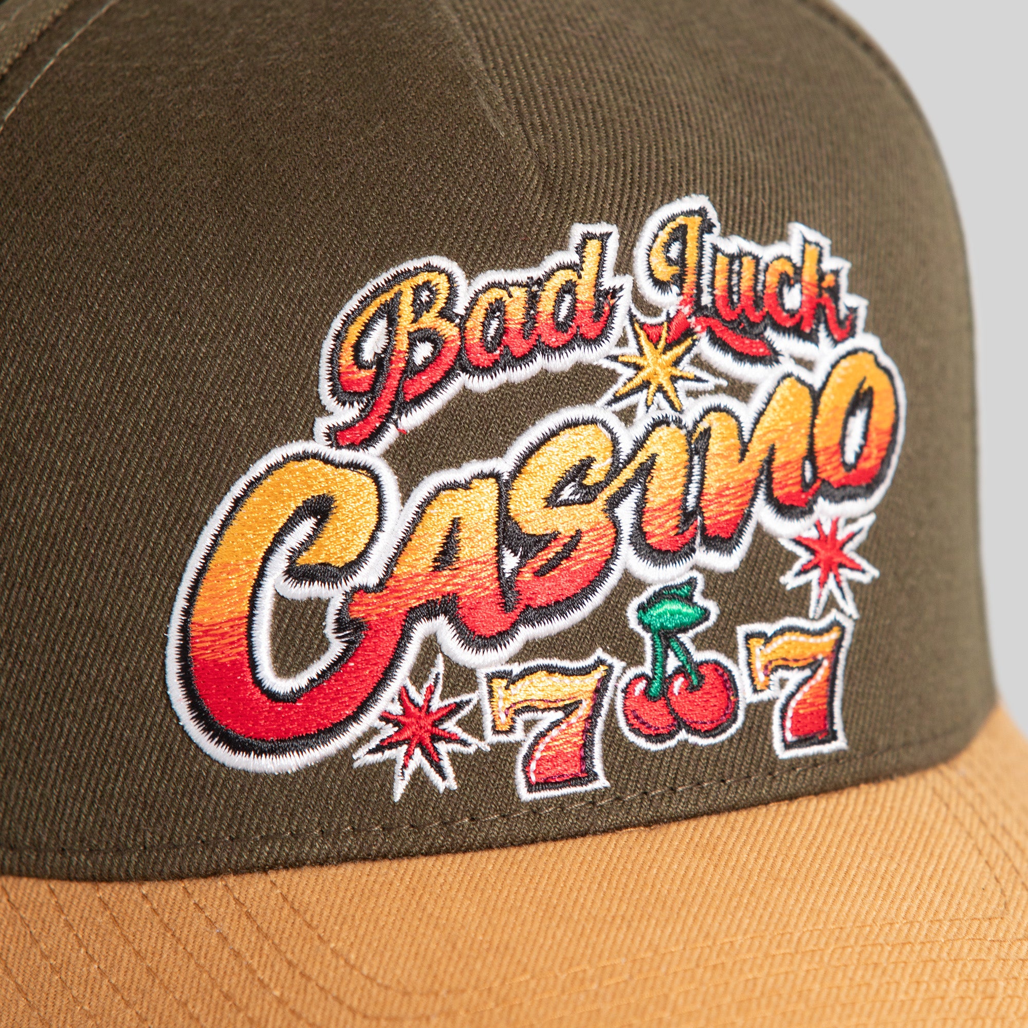 BAD LUCK CASINO OLIVE WHEAT WOOL TRUCKER