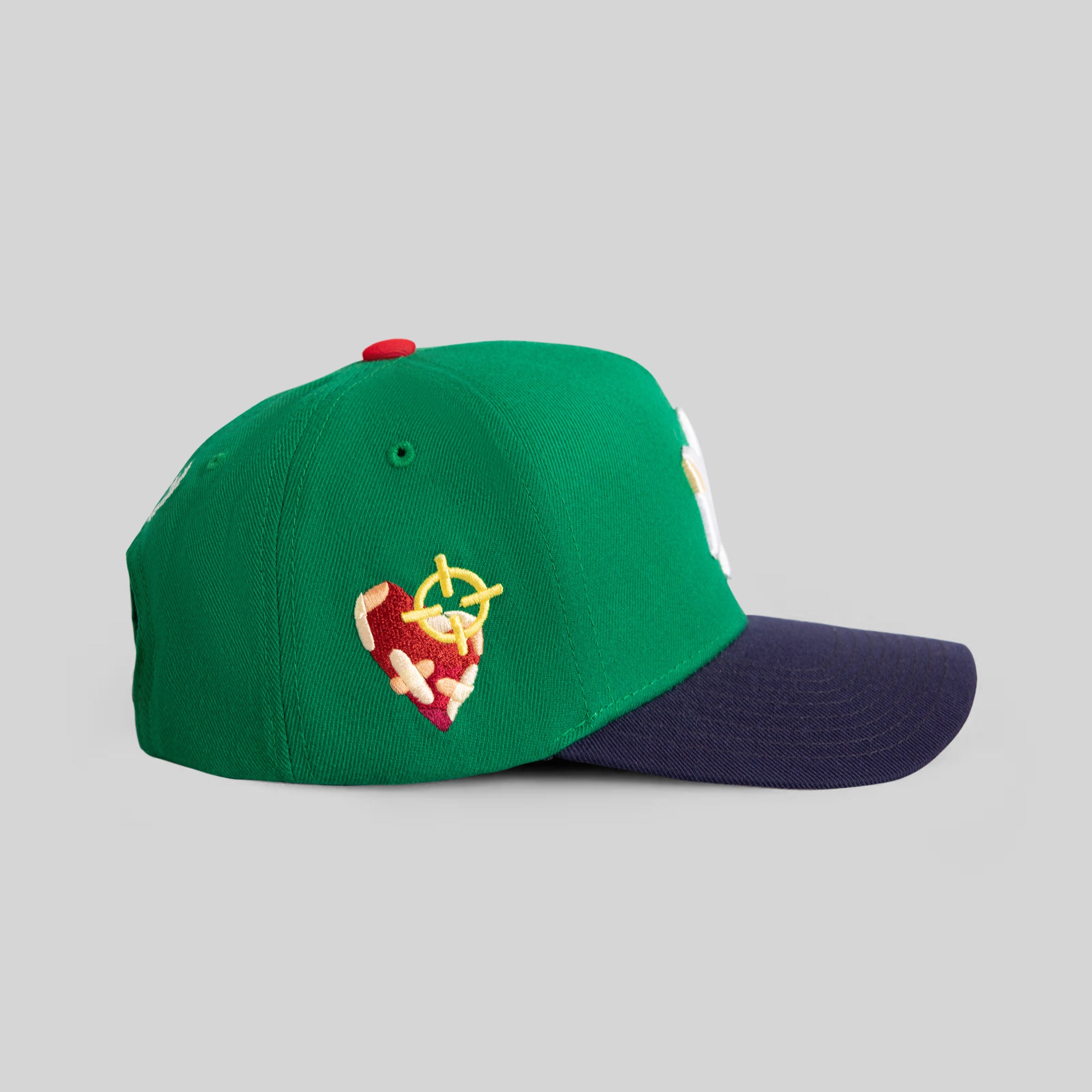 FIELD GRADE X KURVE STUDIO NY IS HEALING KELLY GREEN NAVY TRUCKER