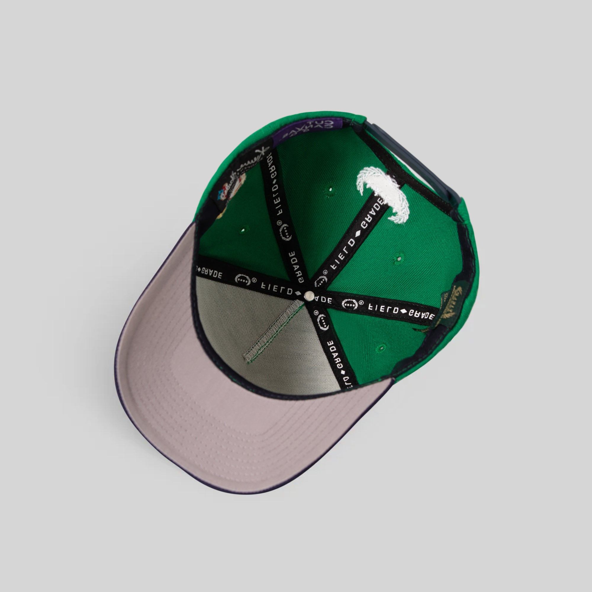 FIELD GRADE X KURVE STUDIO NY IS HEALING KELLY GREEN NAVY TRUCKER