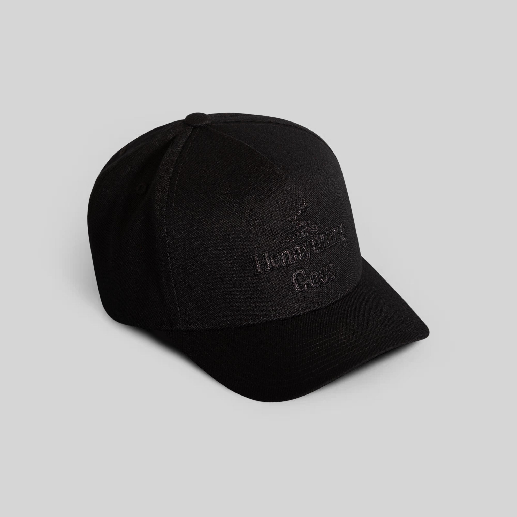 HENNYTHING GOES BLACKOUT WOOL TRUCKER