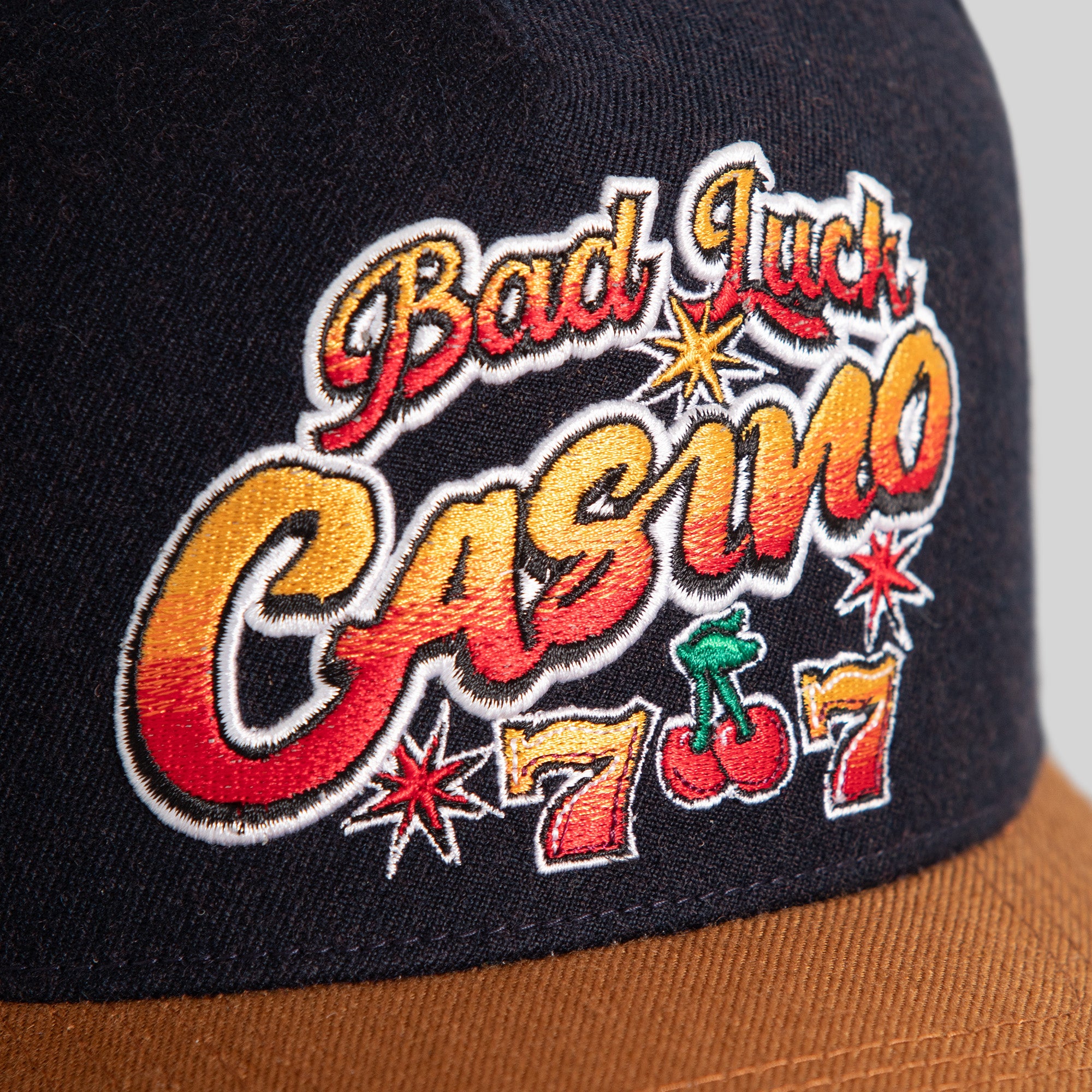 BAD LUCK CASINO DEEP NAVY SESAME WOOL TRUCKER