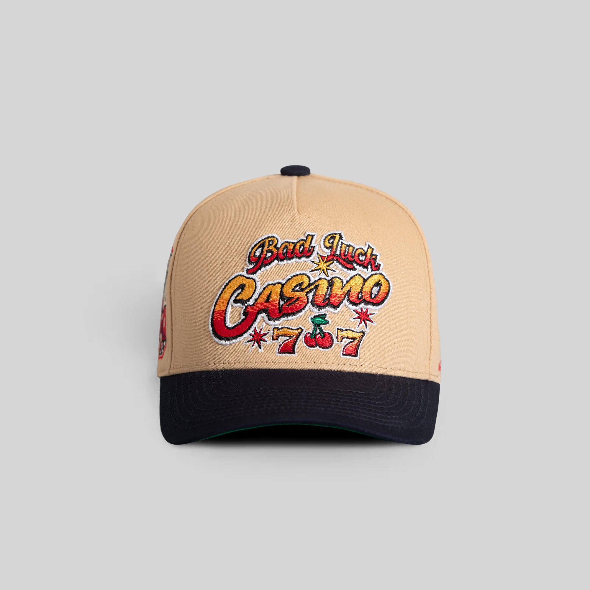 BAD LUCK CASINO TAUPE DEEP NAVY TWILL TRUCKER