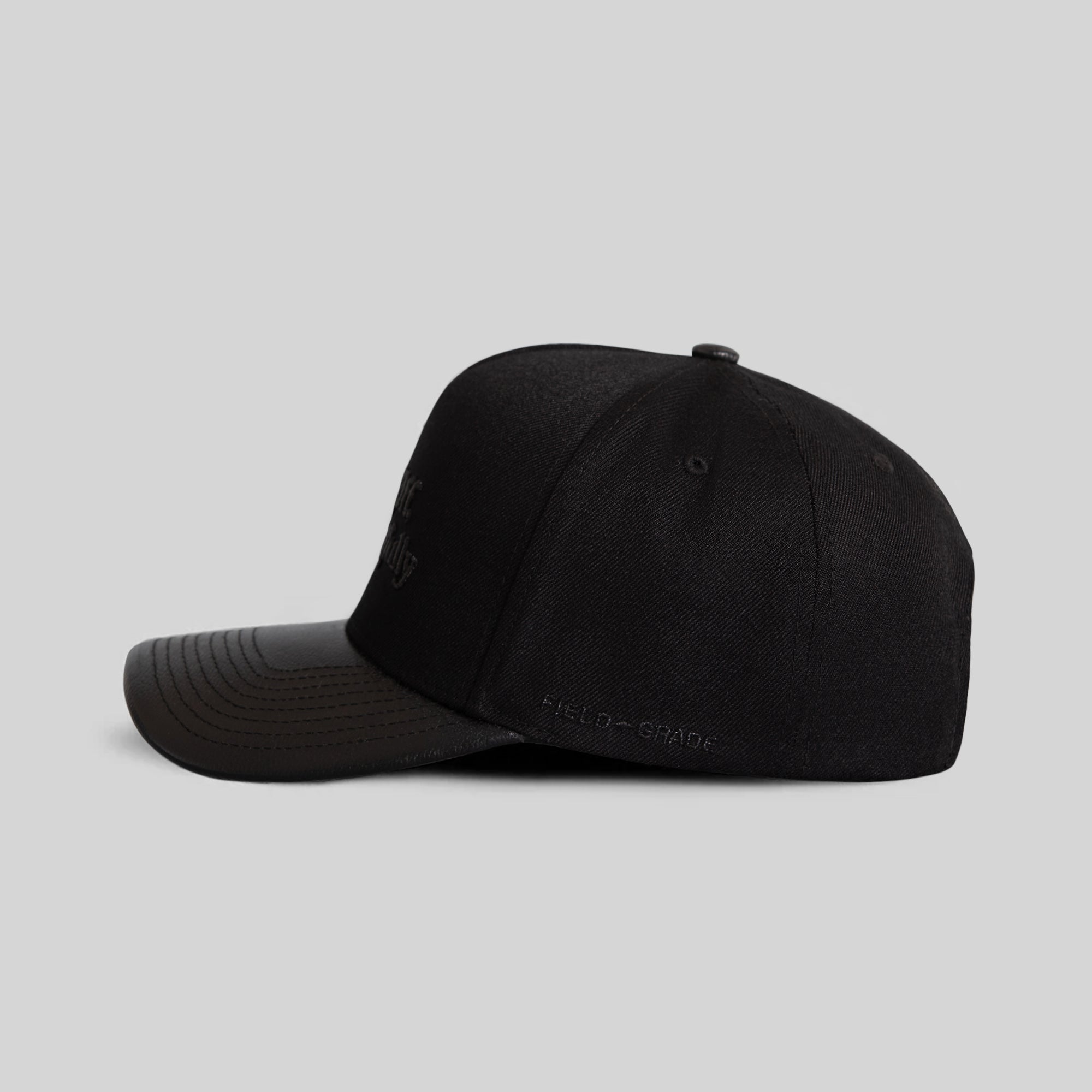 RESPECTFULLY BLACKOUT WOOL LEATHER TRUCKER