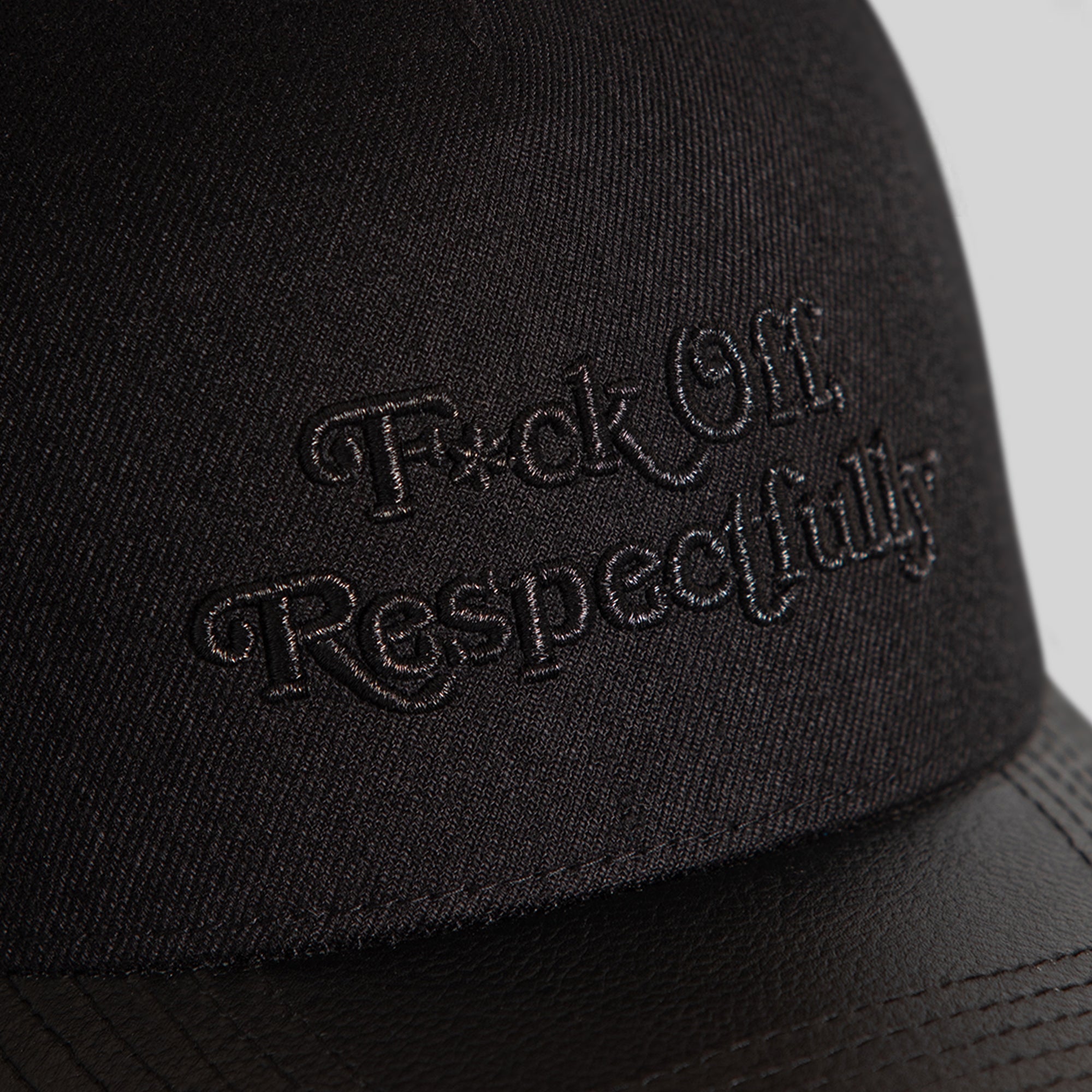 RESPECTFULLY BLACKOUT WOOL LEATHER TRUCKER