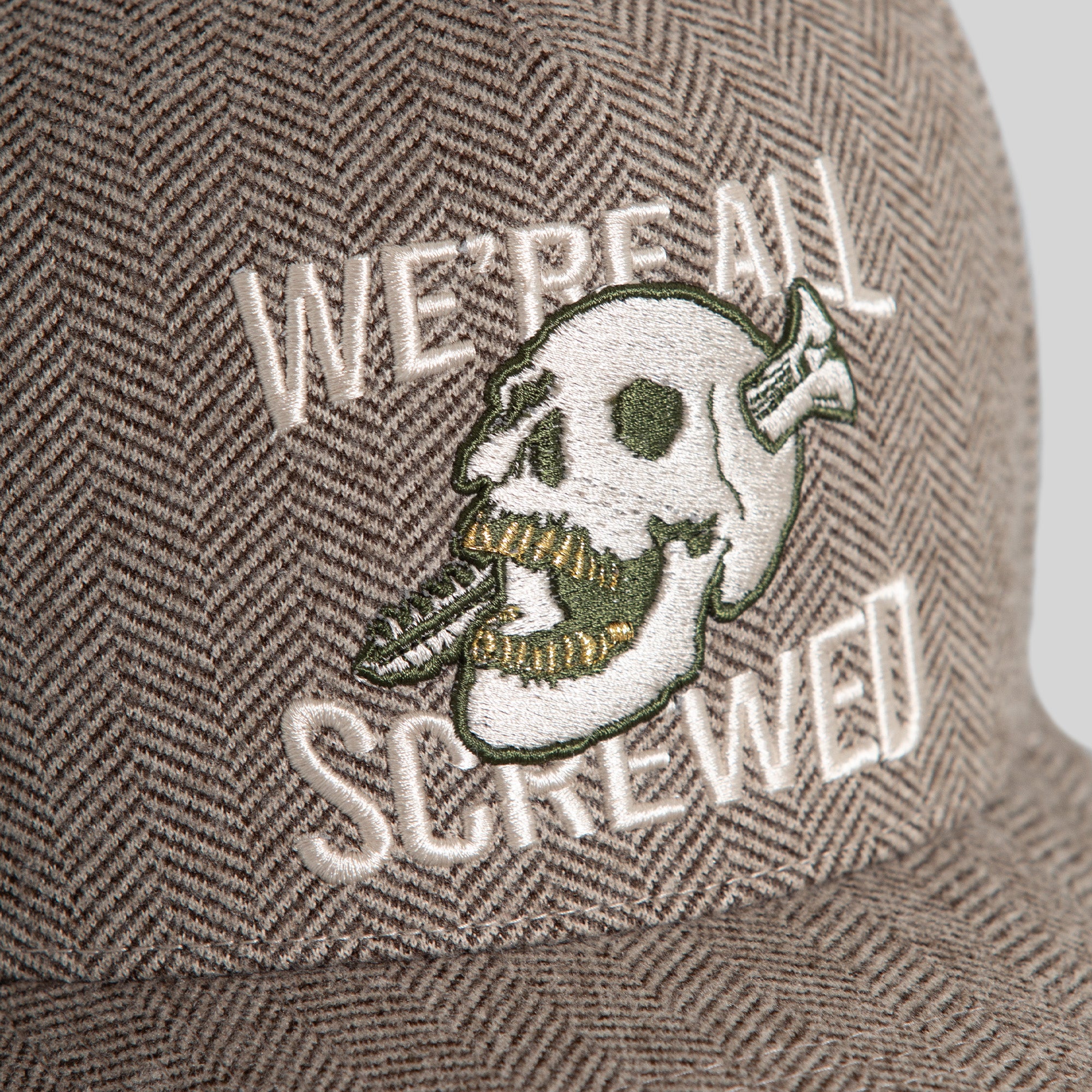 WERE ALL SCREWED HERRINGBONE OLIVE WHITE TRUCKER