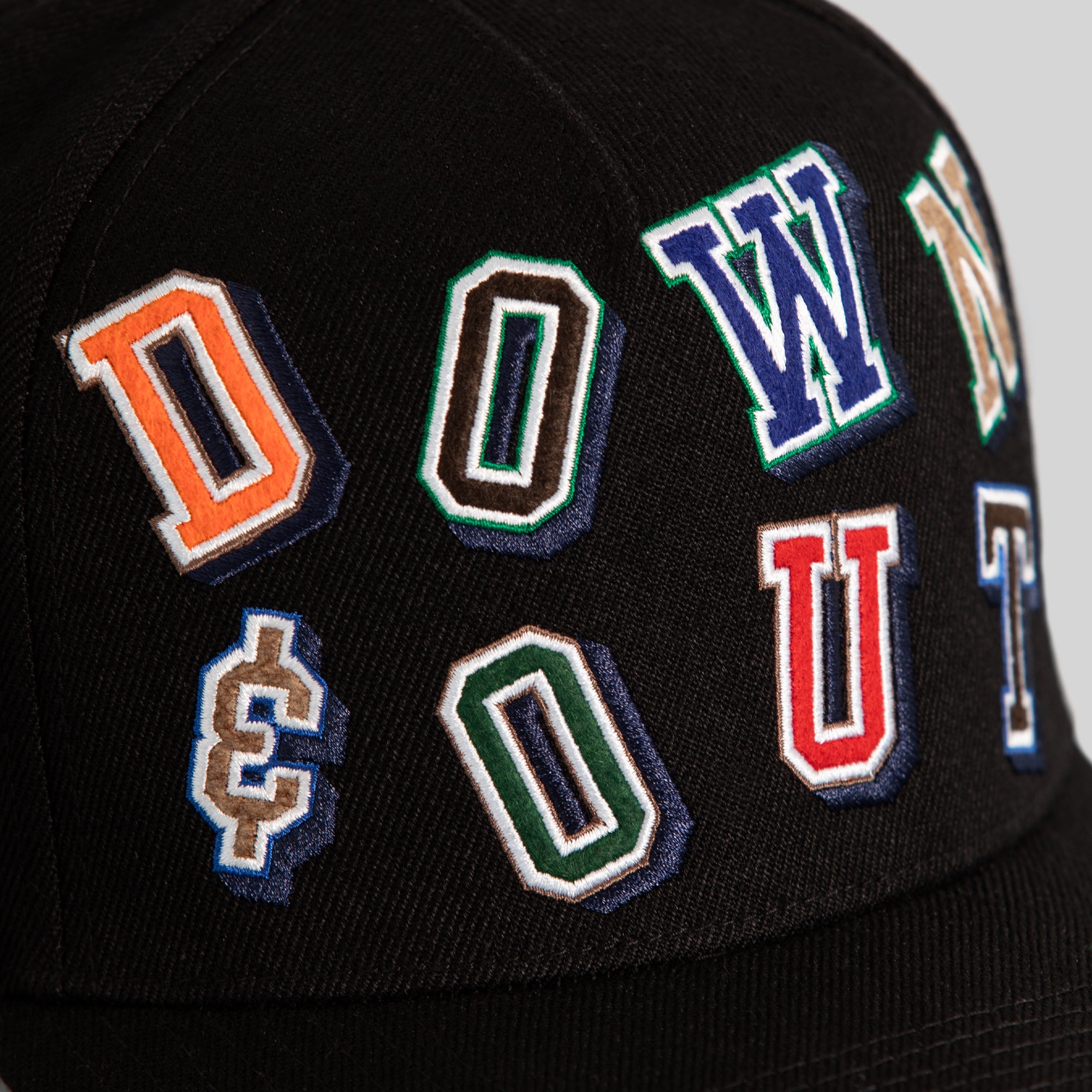 DOWN AND OUT BLACK WOOL TRUCKER