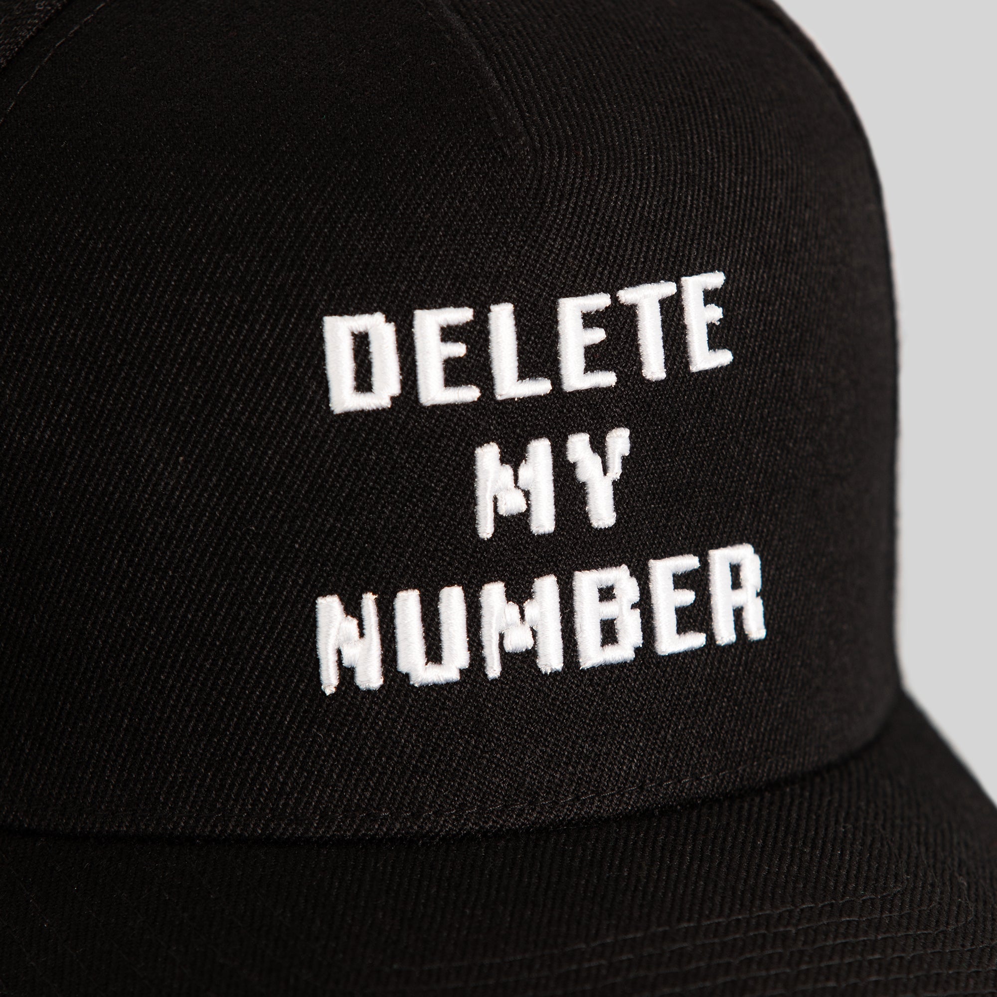 DELETE MY NUMBER BLACK WOOL TRUCKER