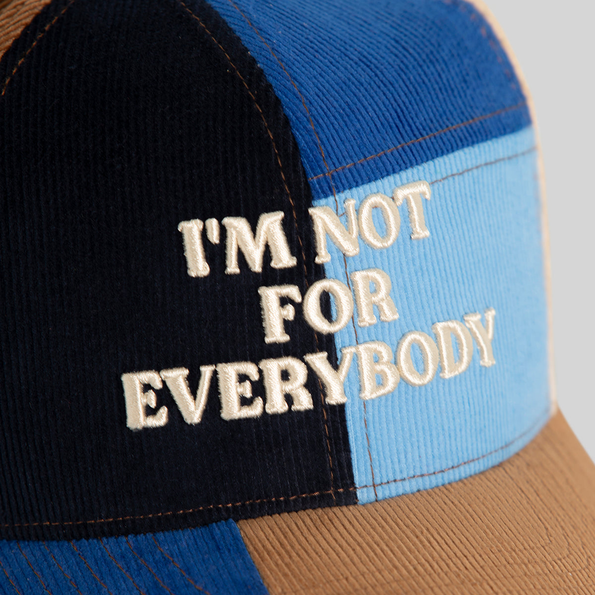 I’M NOT FOR EVERYBODY MULTI CORDUROY PATCHWORK TRUCKER