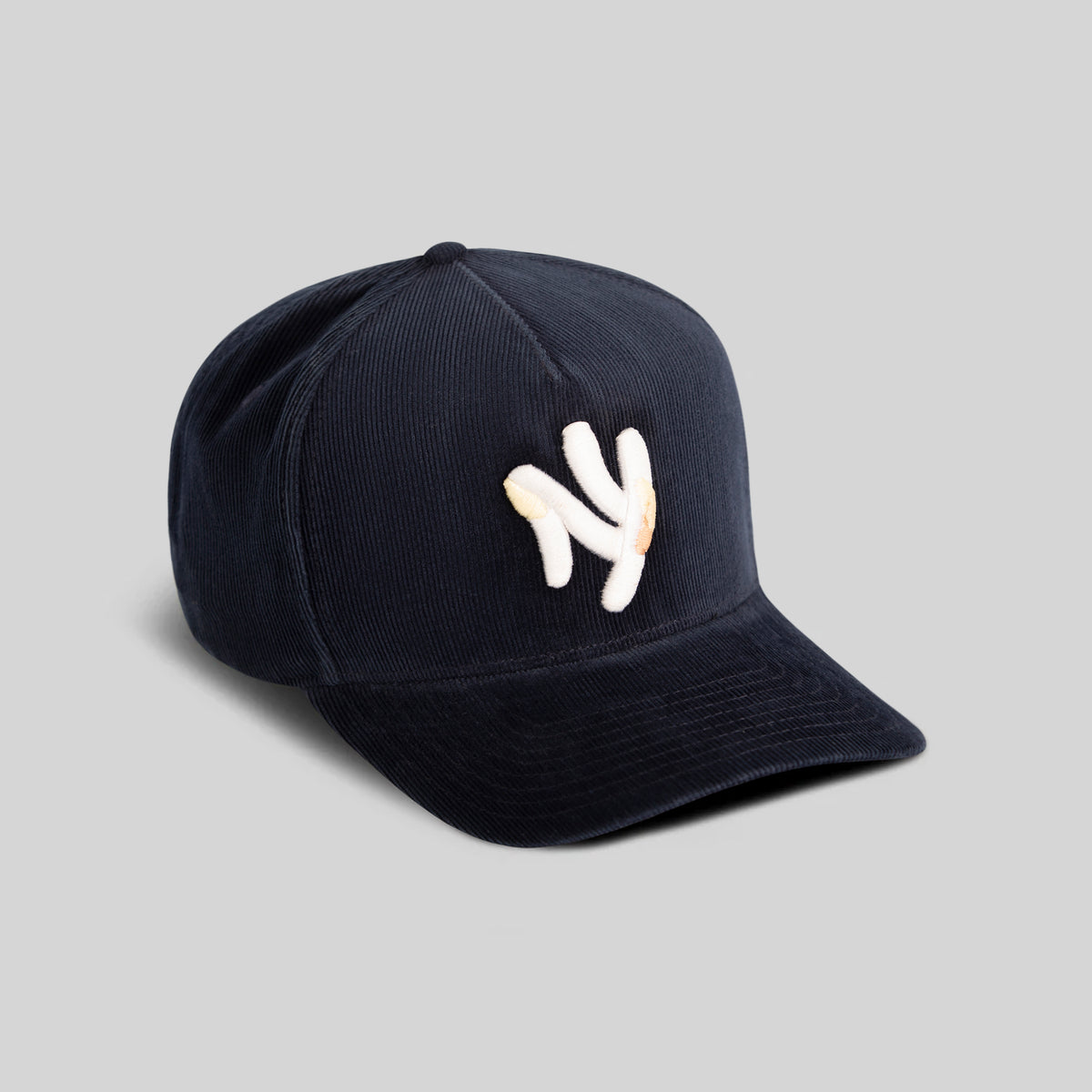FIELD GRADE X KURVE STUDIO NY IS HEALING WASHED CORDUROY DEEP NAVY TRUCKER