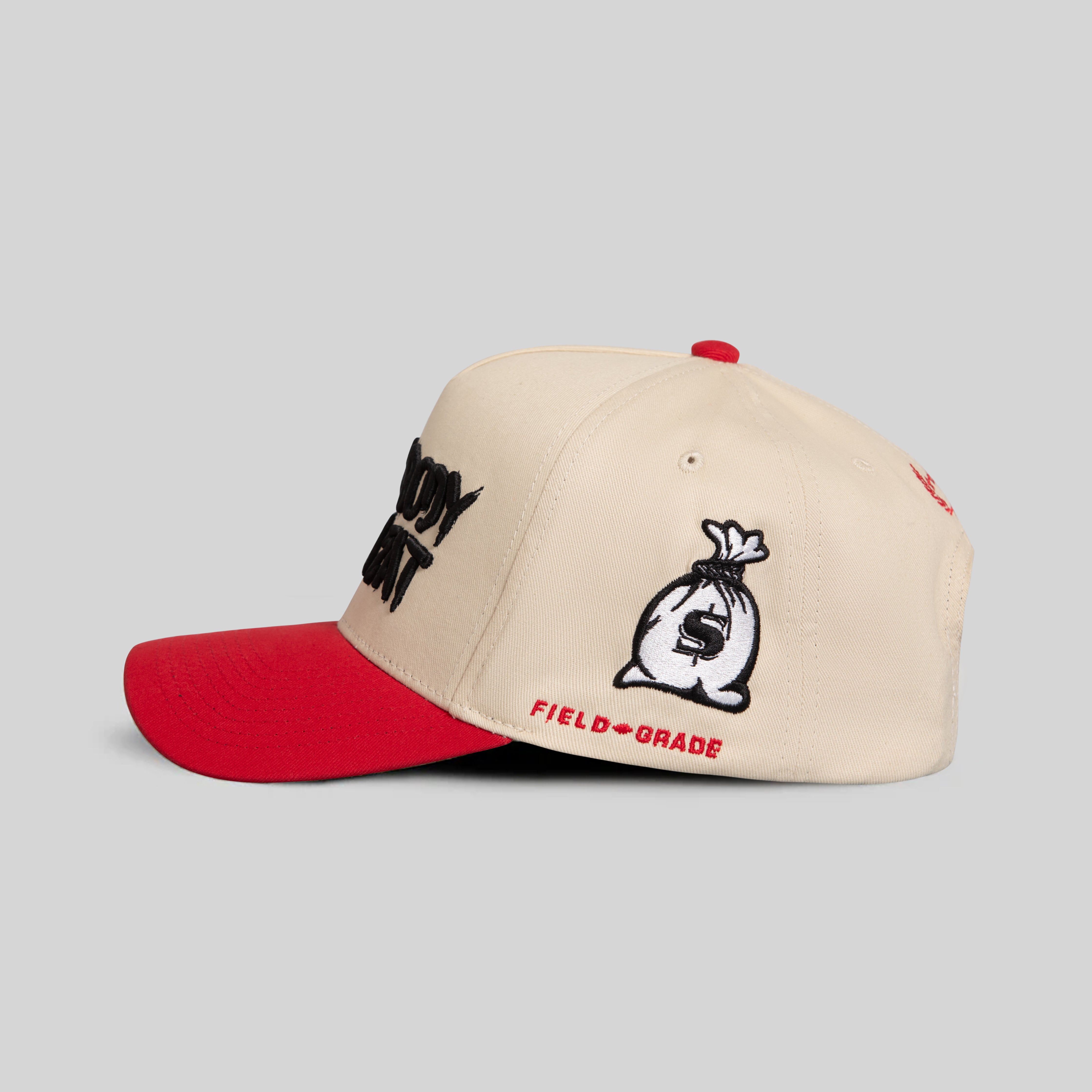 EVERYBODY GOTTA EAT SAND RED TWILL TRUCKER