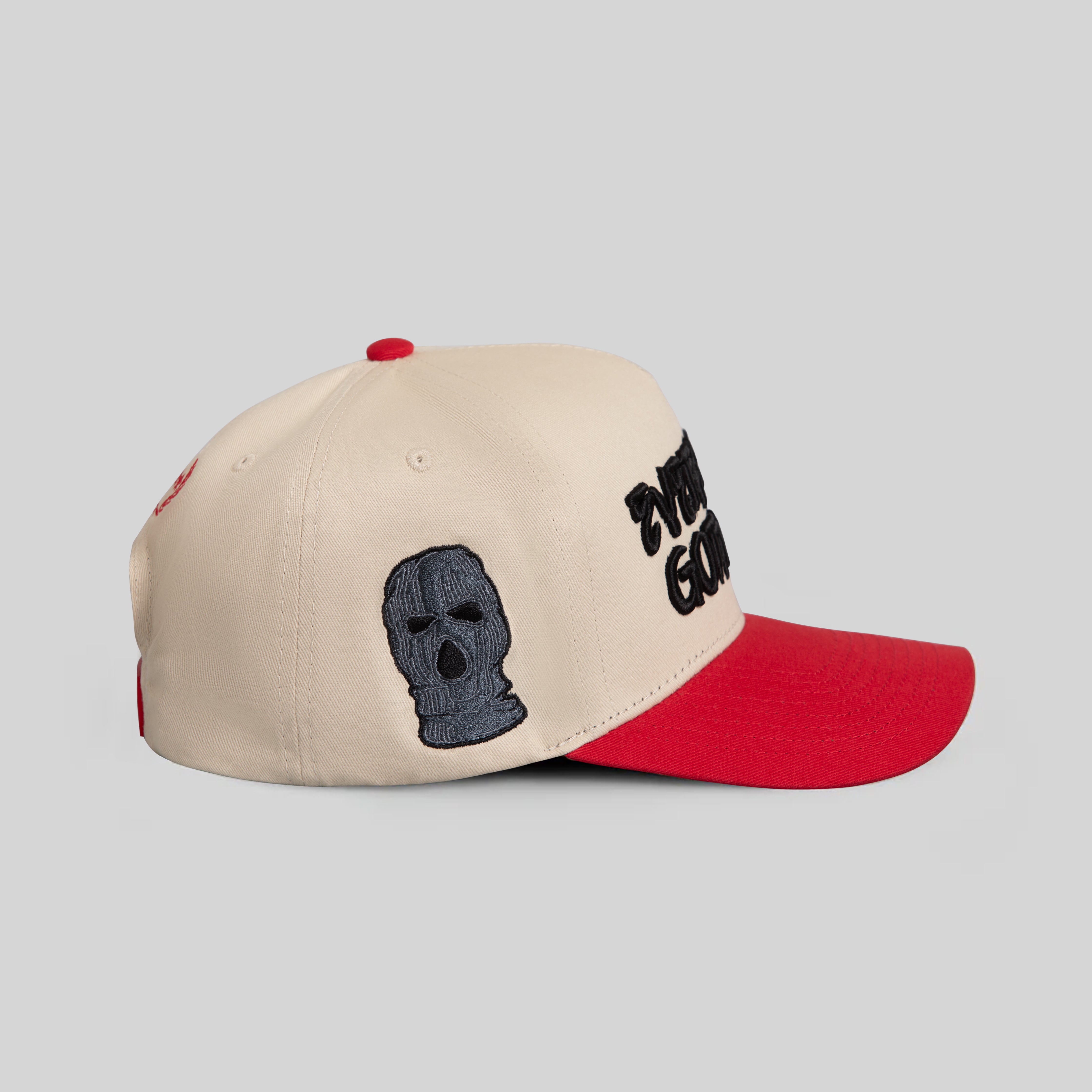 EVERYBODY GOTTA EAT SAND RED TWILL TRUCKER