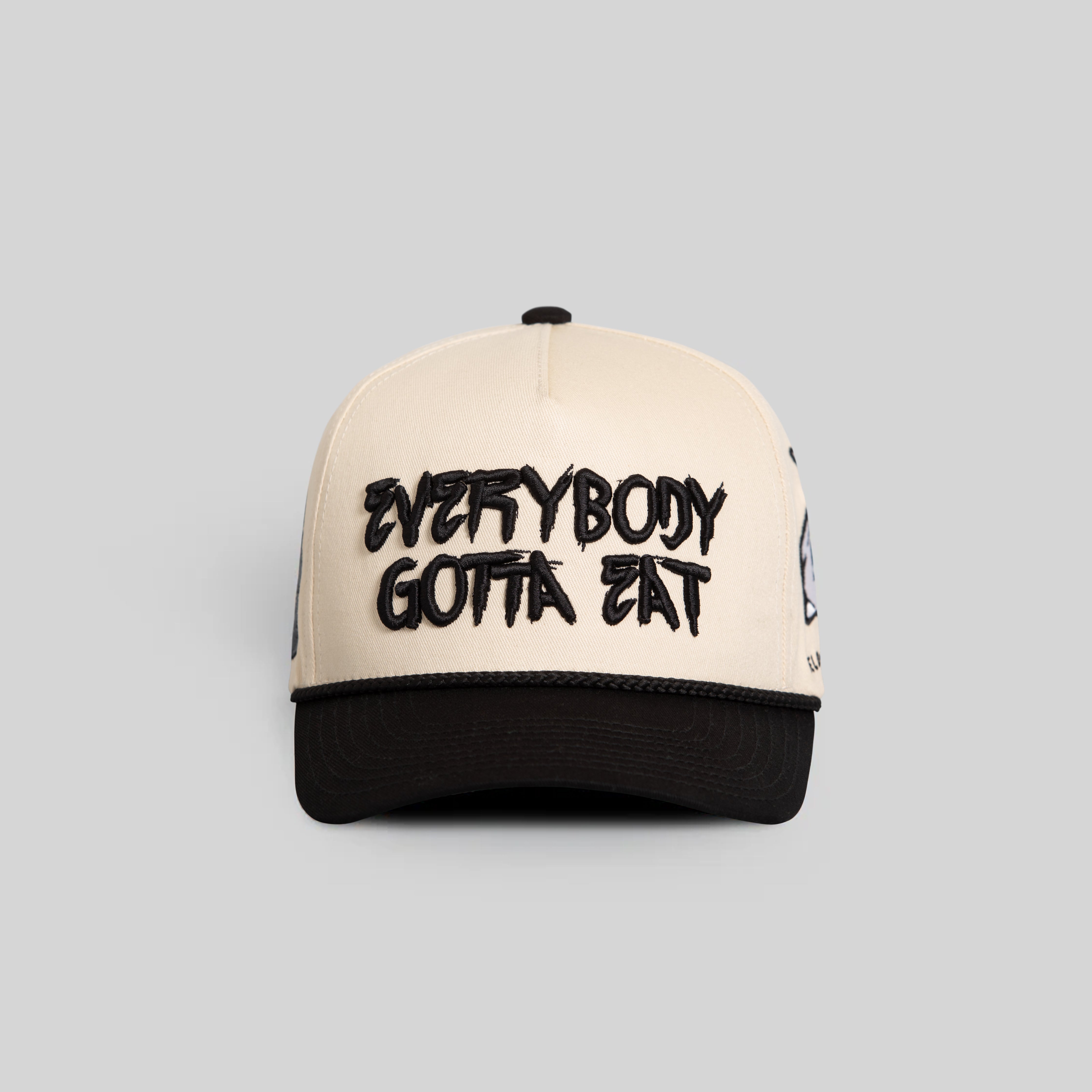 EVERYBODY GOTTA EAT SAND BLACK TWILL TRUCKER