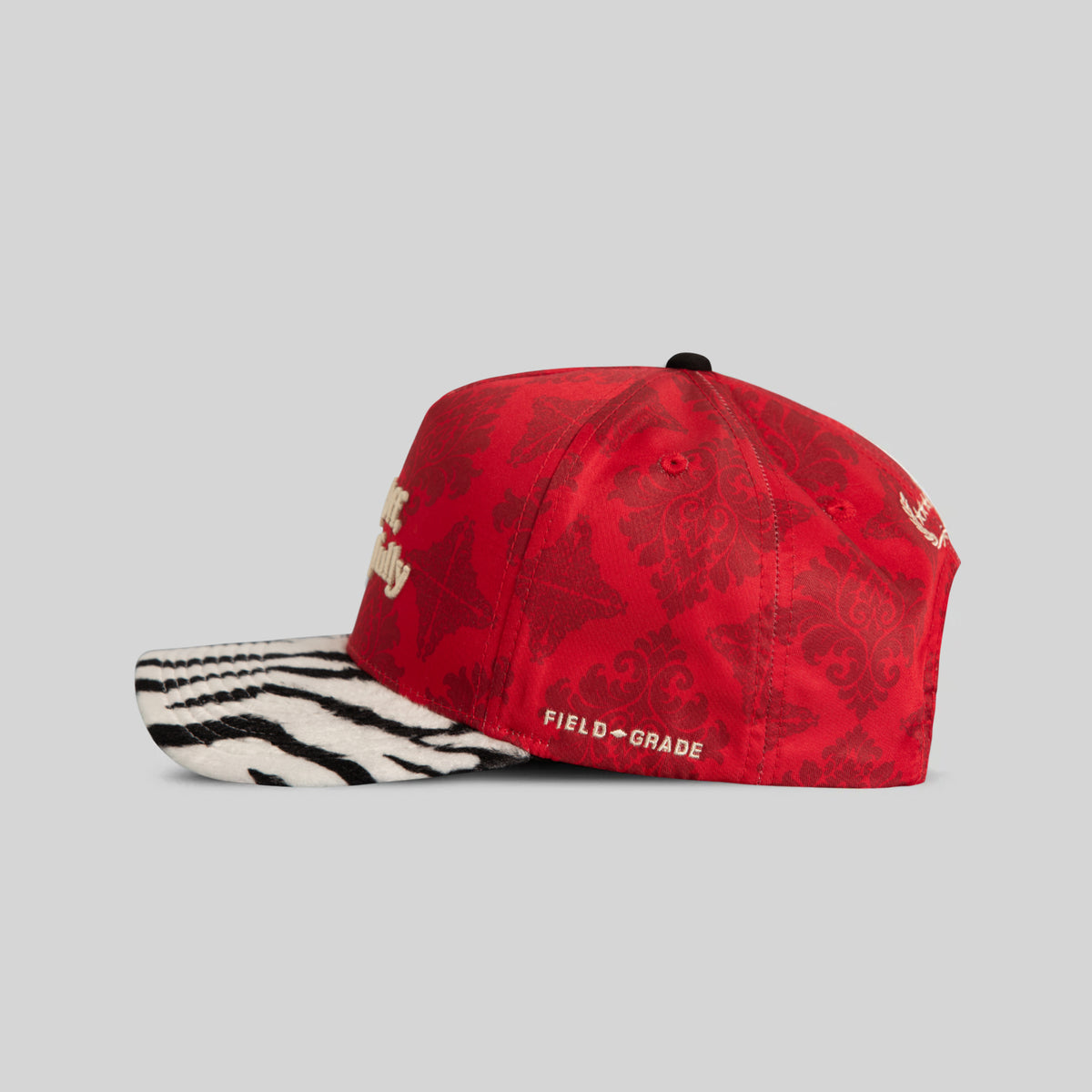 RESPECTFULLY JACQUARD FAUX ZEBRA TWILL TRUCKER