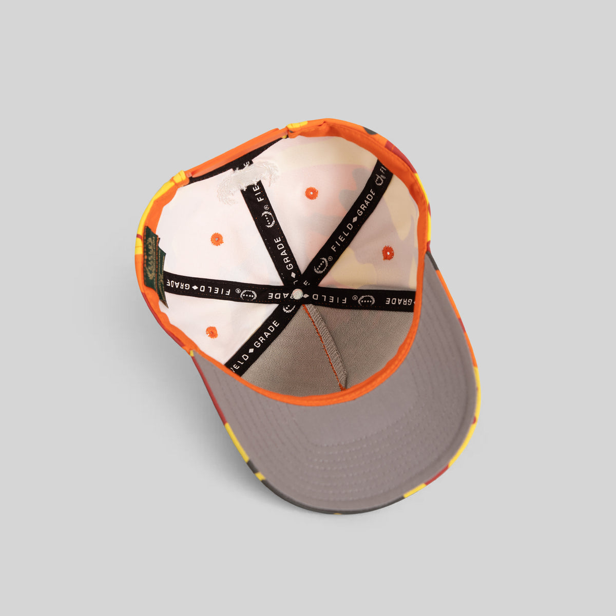 FIELD GRADE COLLEGIATE FLAME CAMO TWILL TRUCKER