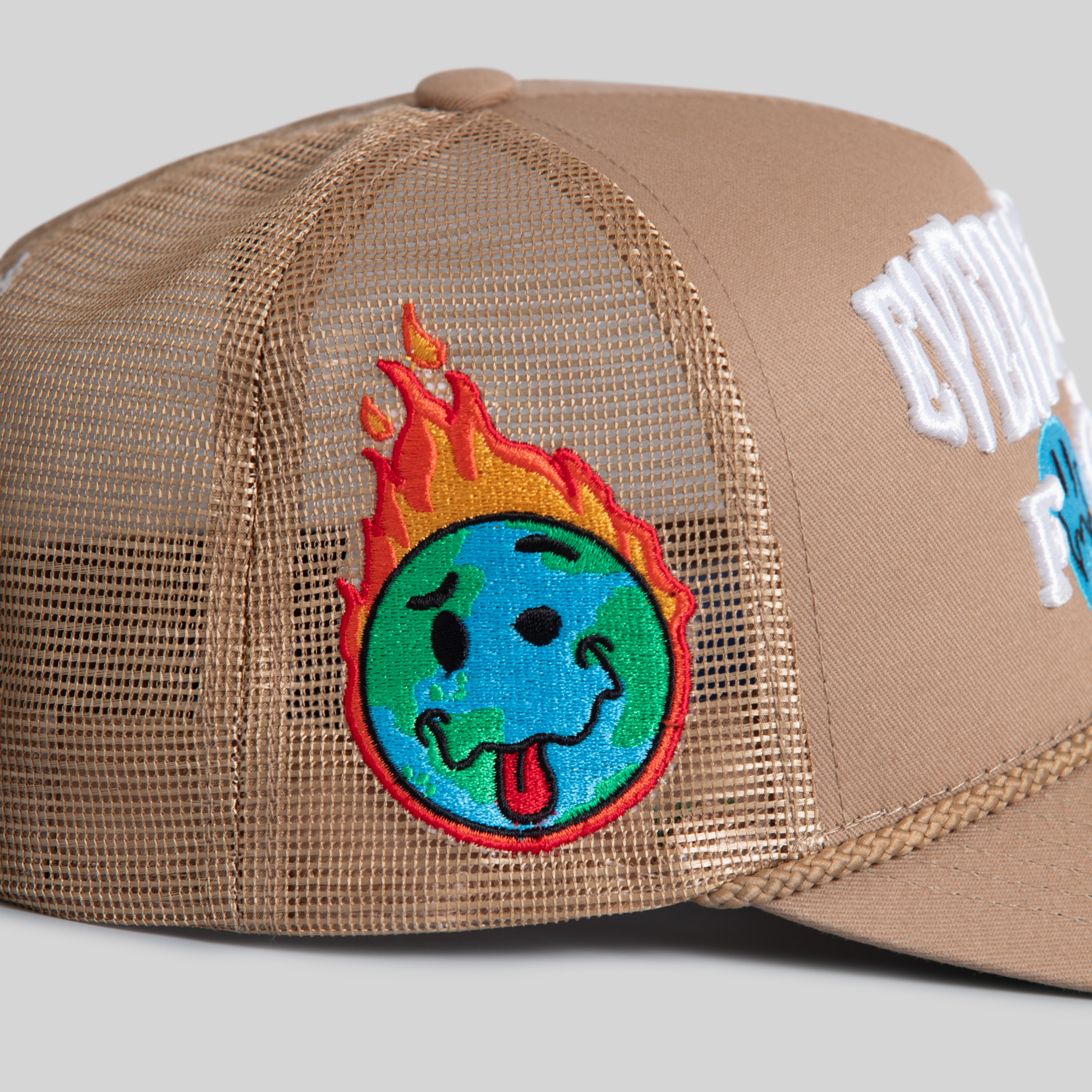 EVERYTHINGS F*CKED ALMOND TWILL MESH TRUCKER