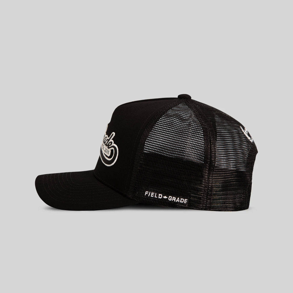 FIELD GRADE COLLEGIATE BLACK TWILL MESH TRUCKER