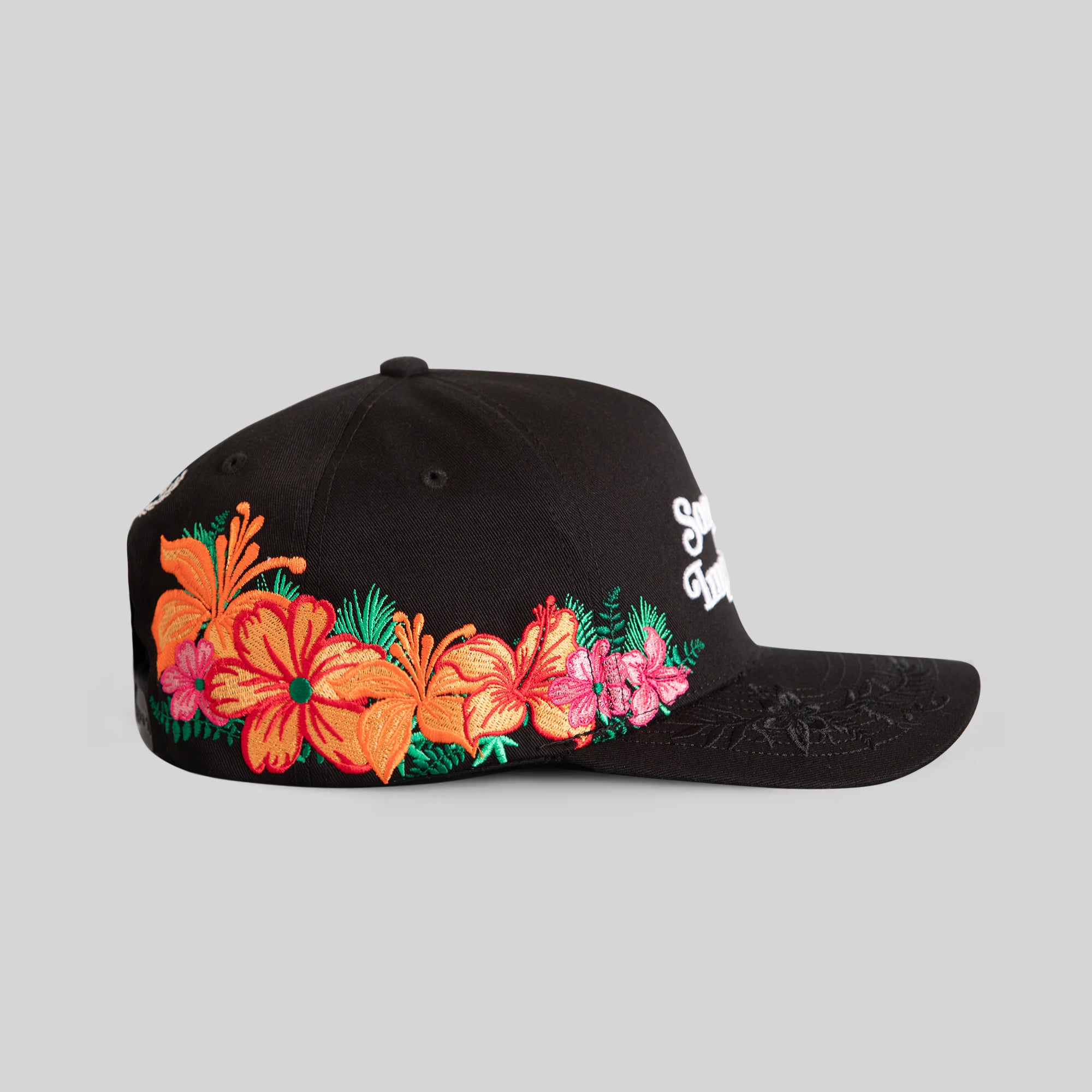 SORRY NOT IMPRESSED BLACK FLORAL TWILL TRUCKER