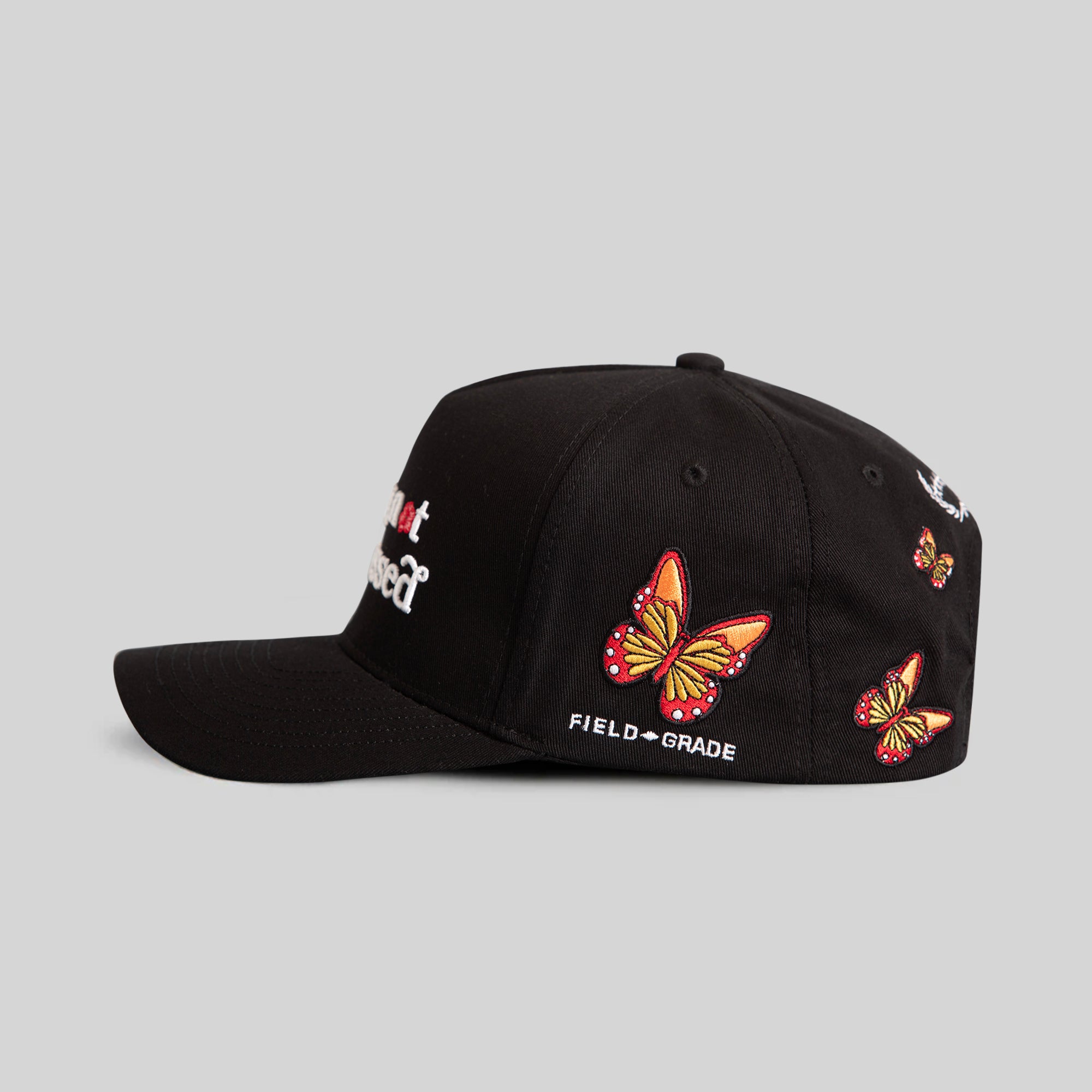 SORRY NOT IMPRESSED BLACK FLORAL TWILL TRUCKER