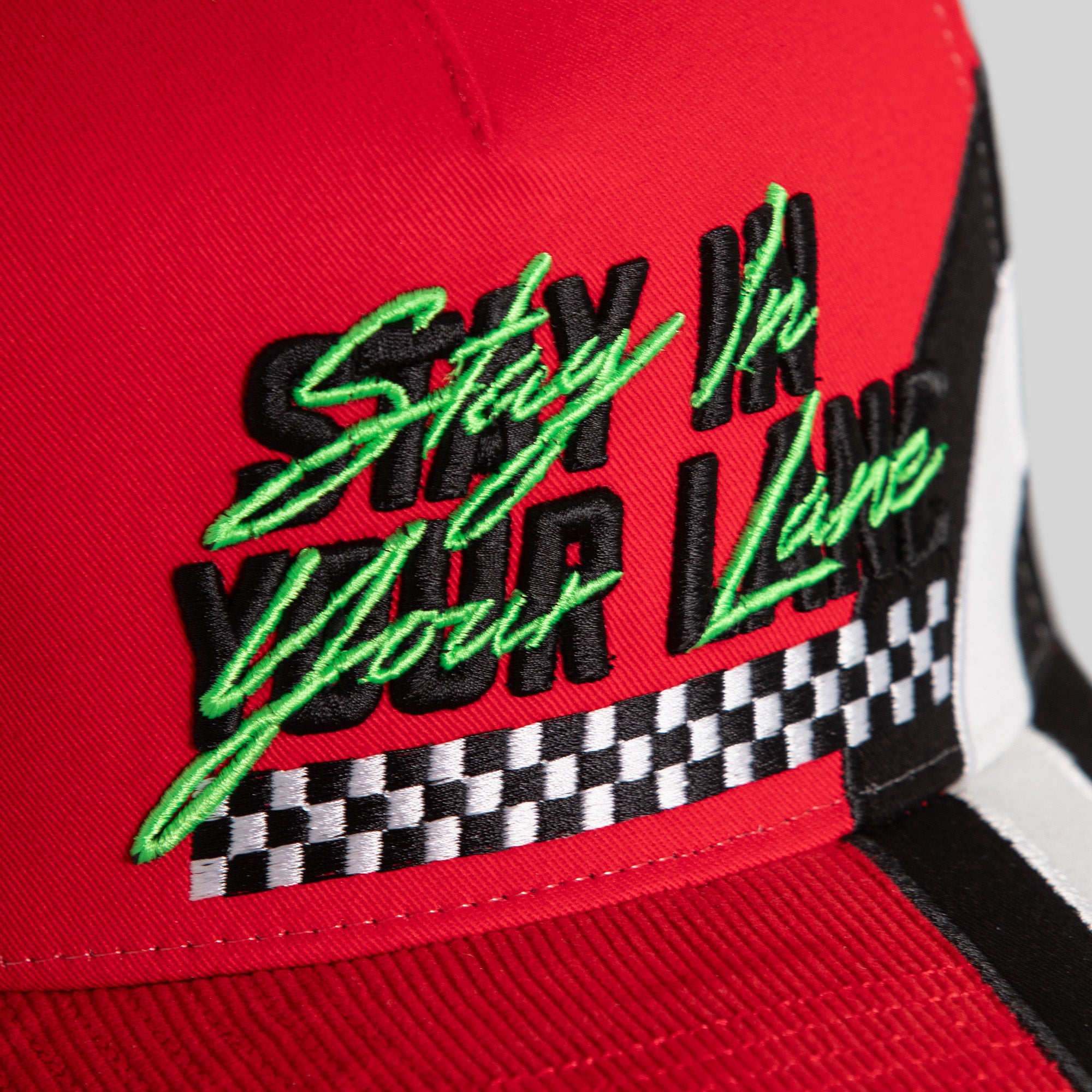 STAY IN YOUR LANE RED TWILL TRUCKER