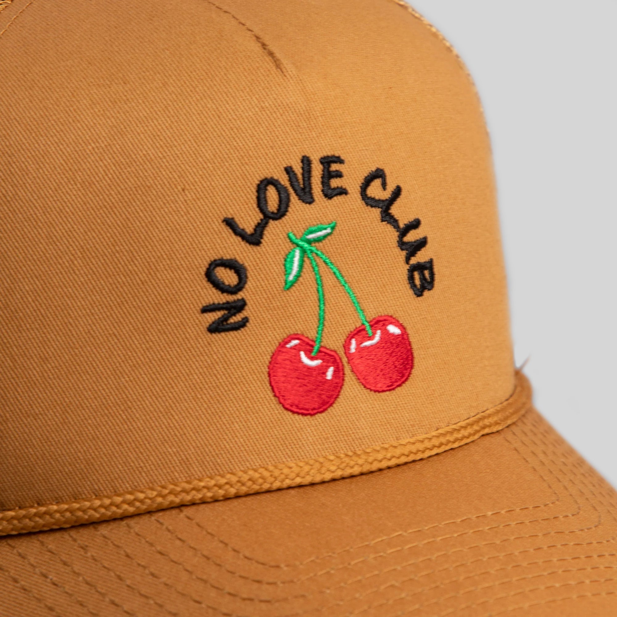 NO LOVE CLUB WHEAT TRUCKER HAT