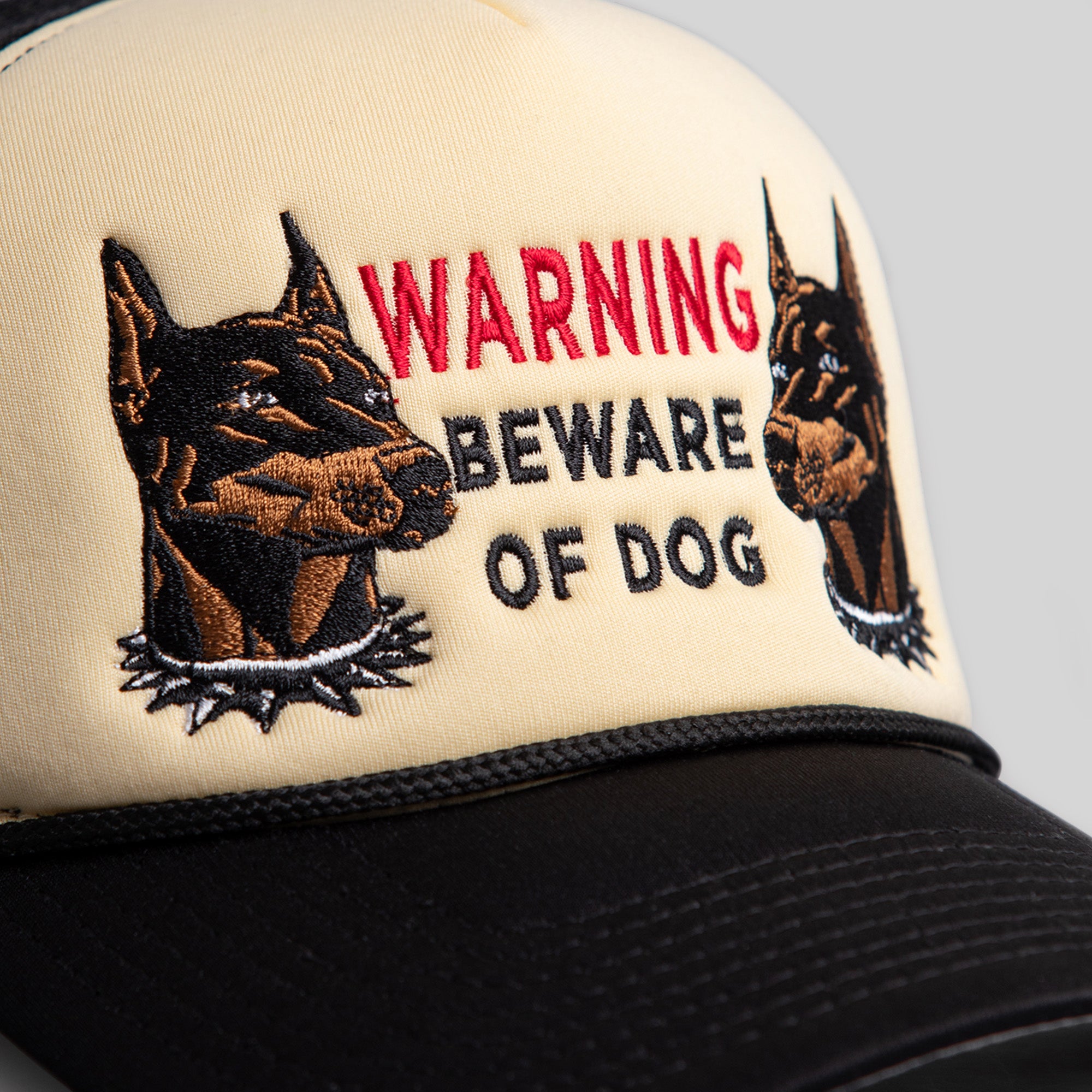 BEWARE OF DOG SAND/BLACK TRUCKER HAT