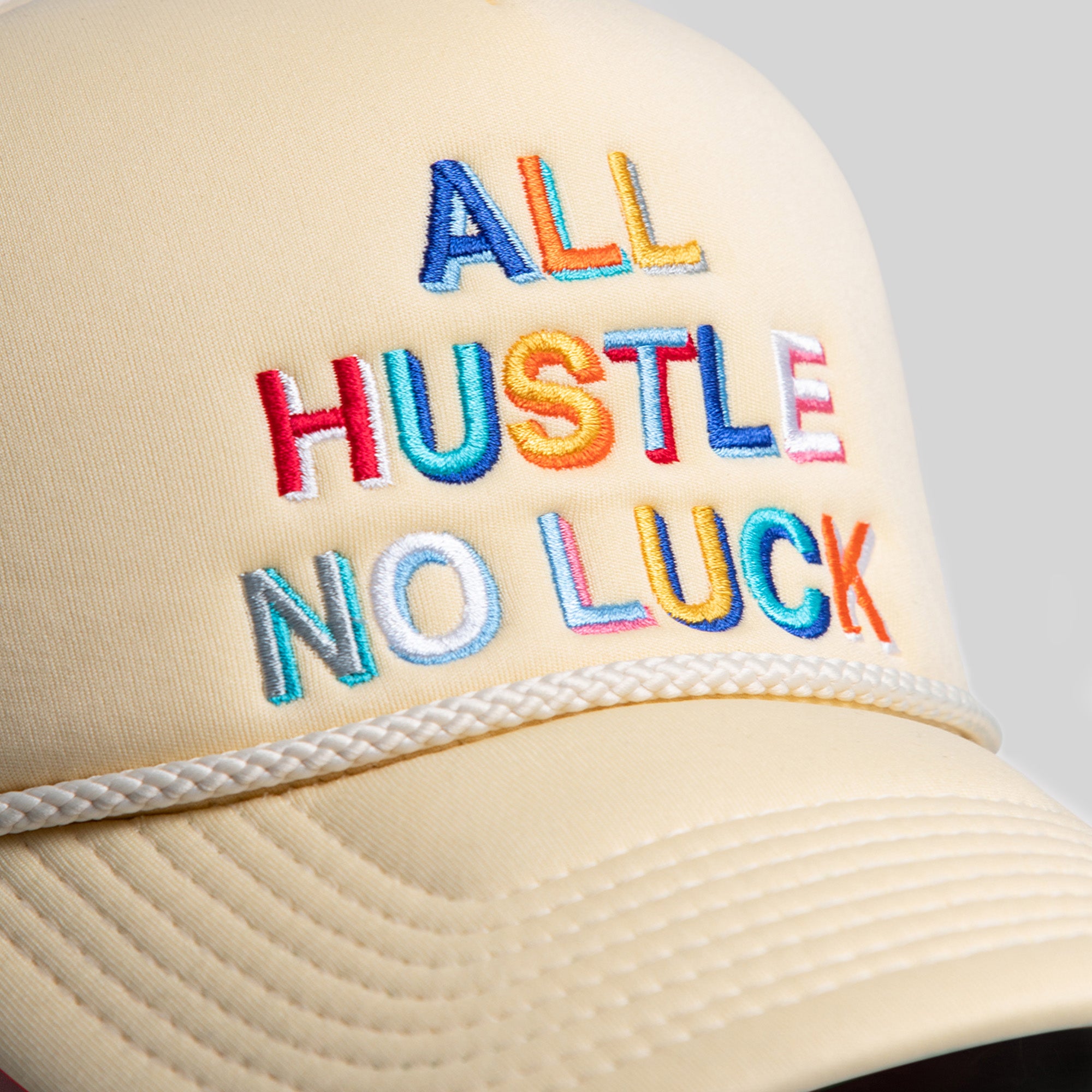 ALL HUSTLE NO LUCK SAND TRUCKER HAT
