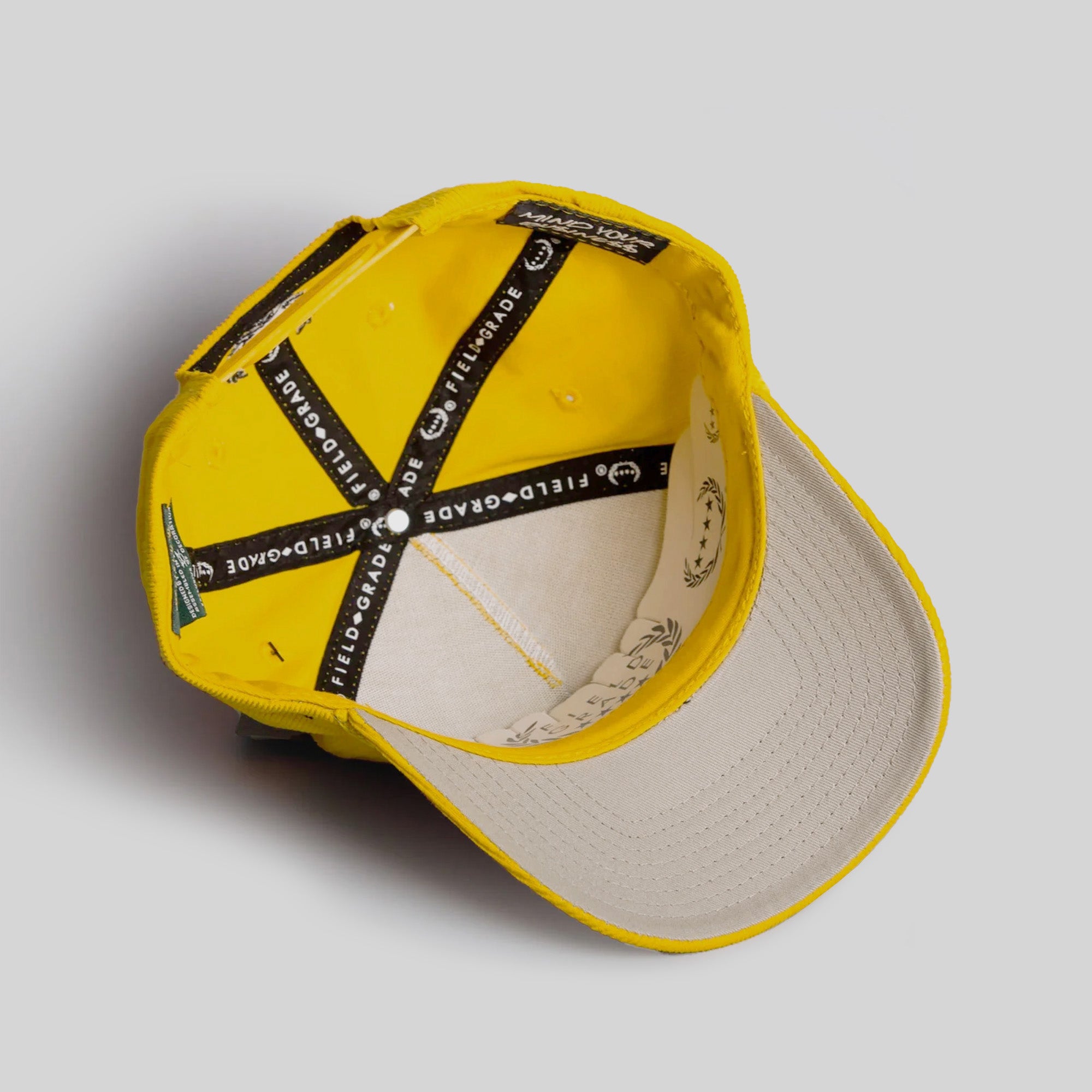 MIND YOUR BUSINESS YELLOW GOLD CORDUROY TRUCKER HAT