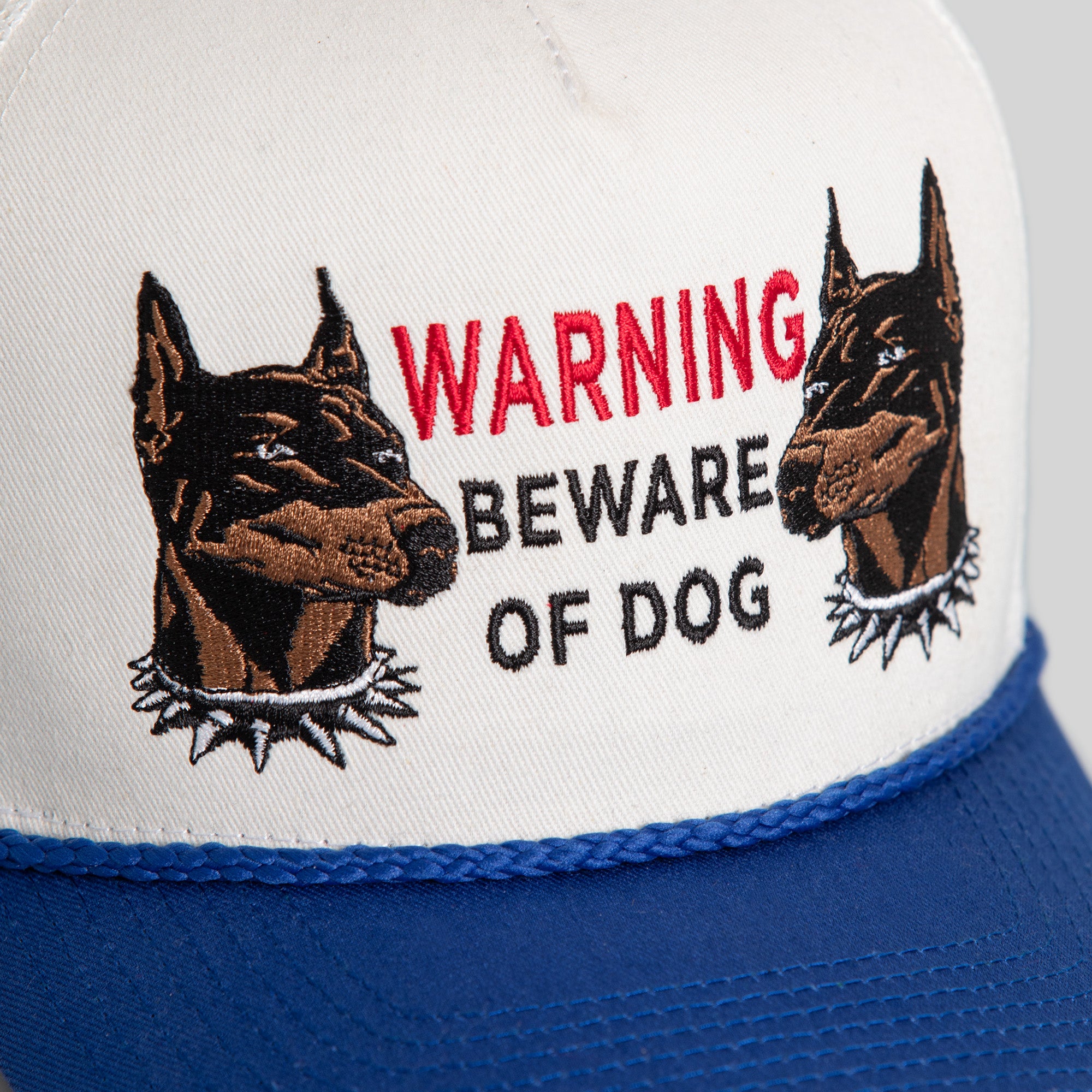 BEWARE OF DOG OFF WHITE GAME ROYAL TWILL TRUCKER