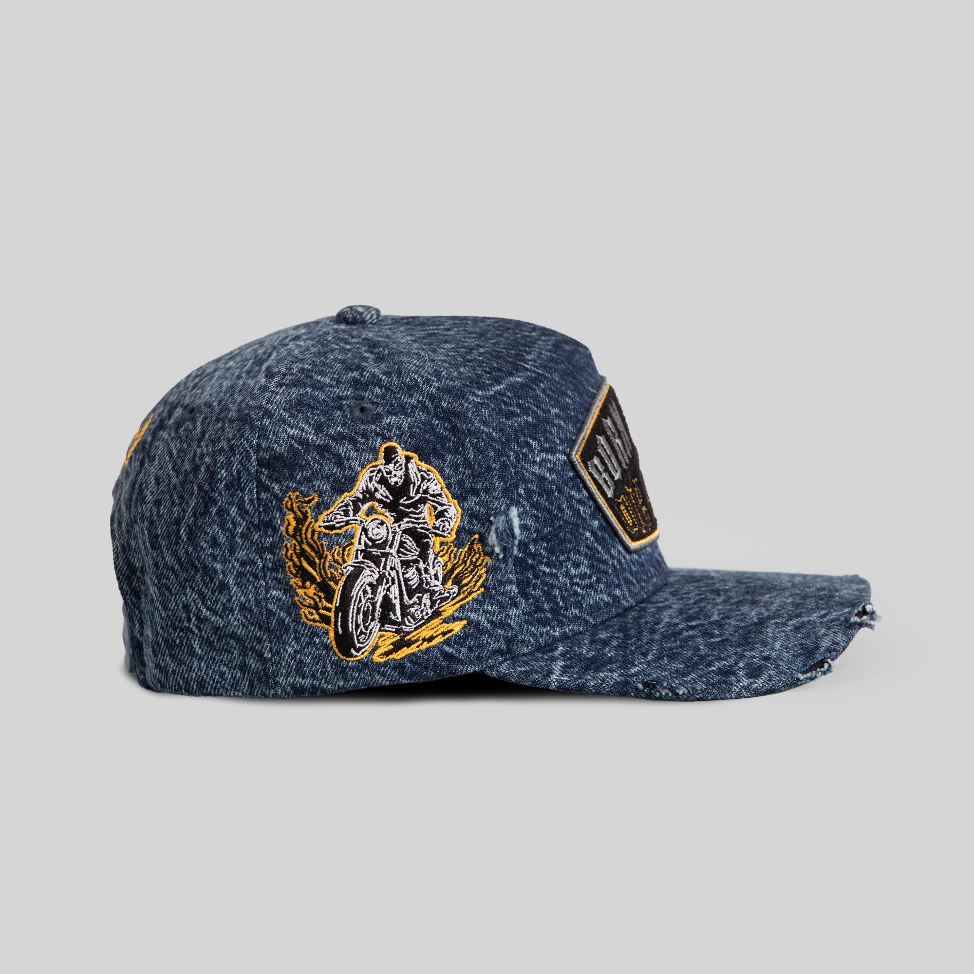 BORN ALONE BLUE DISTRESSED DENIM TRUCKER