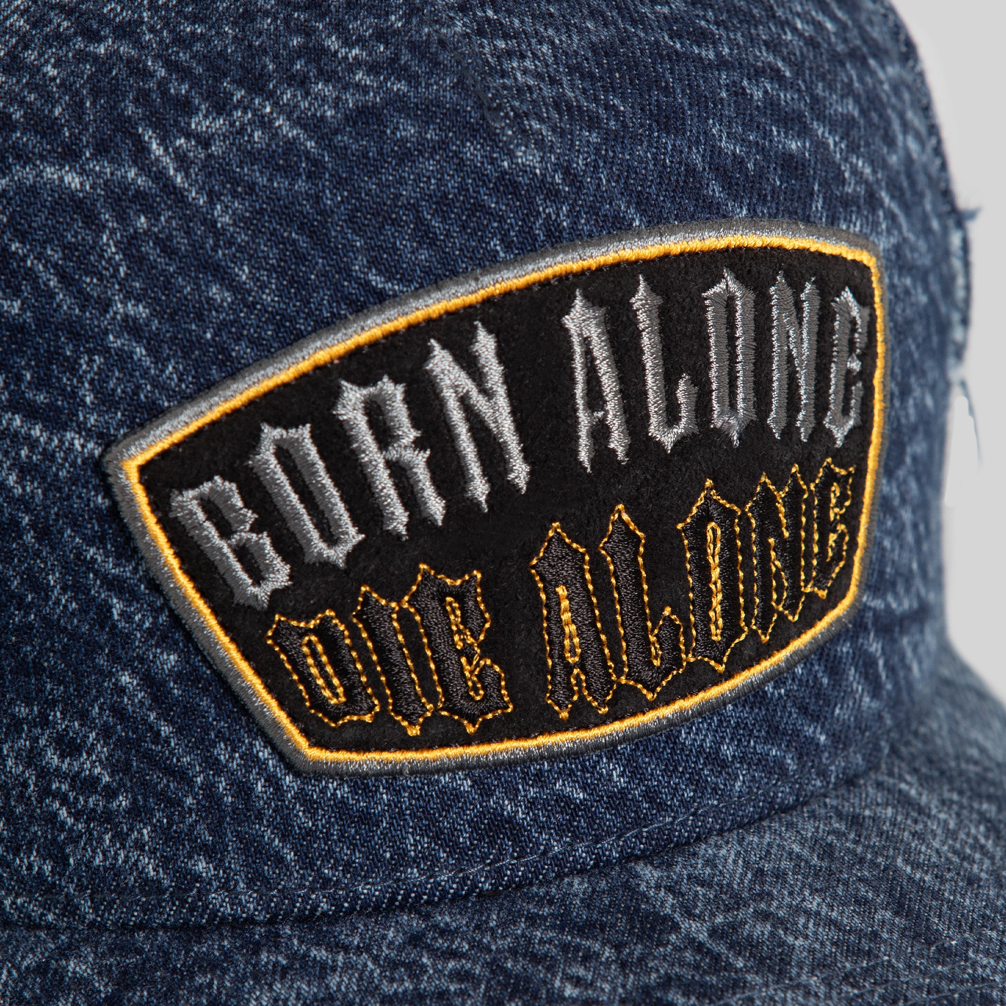 BORN ALONE BLUE DISTRESSED DENIM TRUCKER
