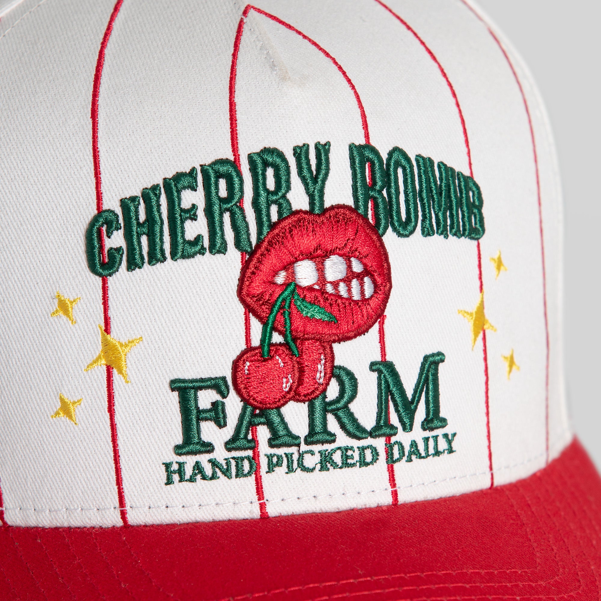 CHERRY BOMB PINSTRIPE TWILL TRUCKER