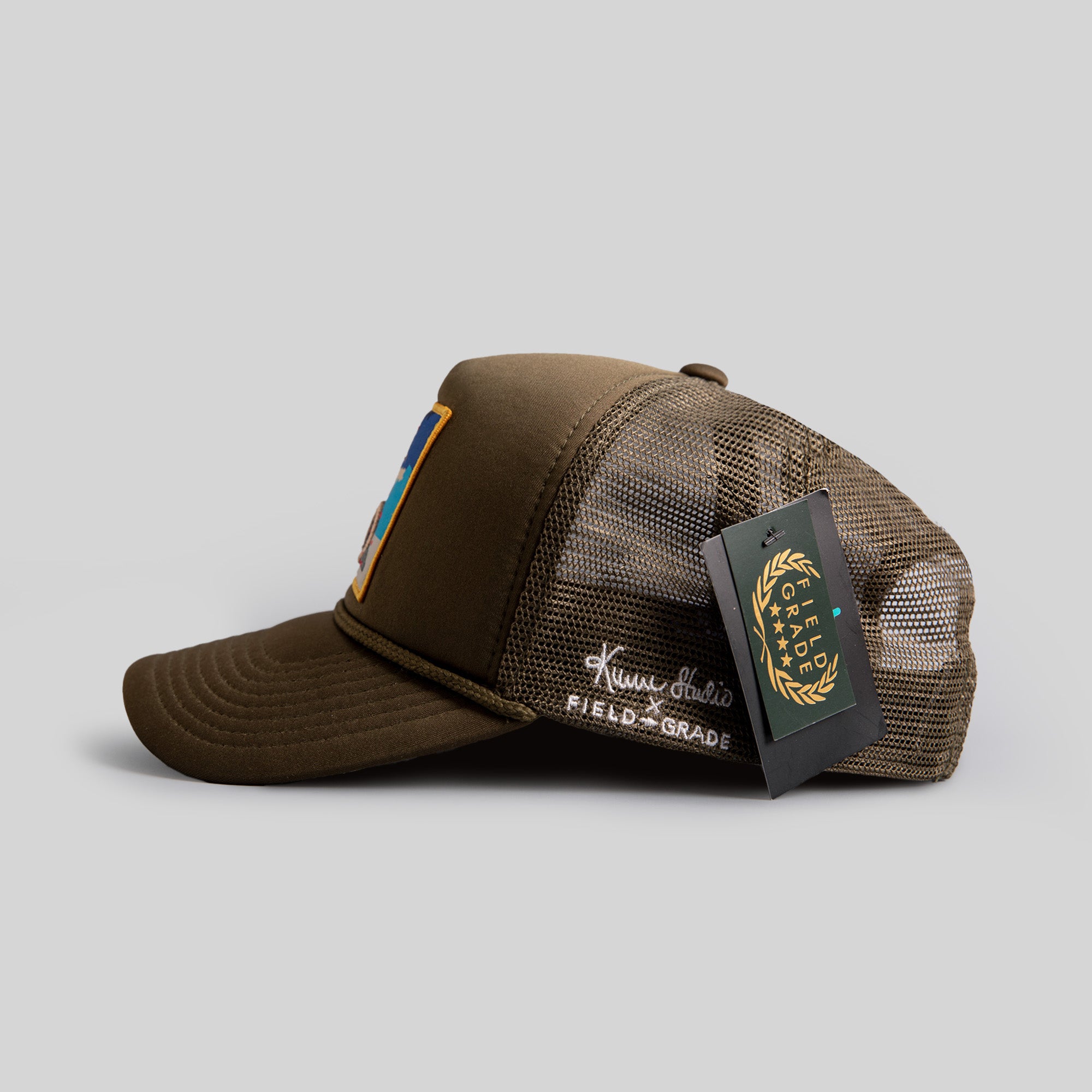 FIELD GRADE X KURVE STUDIO HEAVY IS THE HEAD OLIVE TRUCKER